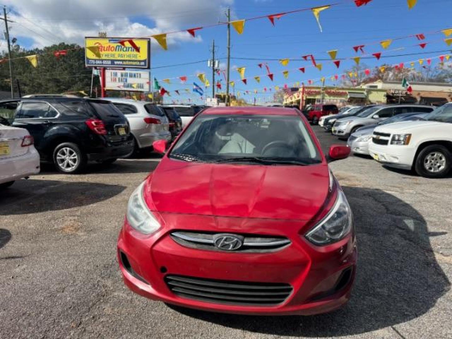 2017 Red Hyundai Accent SE 5-Door 6A (KMHCT5AE0HU) with an 1.6L L4 DOHC 16V engine, 6-Speed Automatic transmission, located at 1806 Veterans Memorial Hwy SW, Austell, GA, 30168, (770) 944-9558, 33.817959, -84.606987 - Photo#1