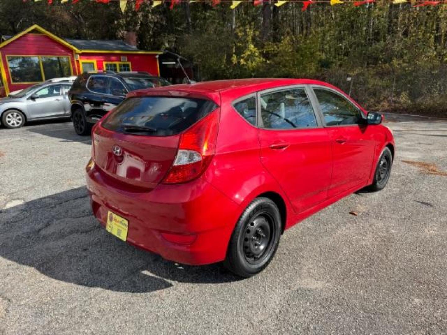 2017 Red Hyundai Accent SE 5-Door 6A (KMHCT5AE0HU) with an 1.6L L4 DOHC 16V engine, 6-Speed Automatic transmission, located at 1806 Veterans Memorial Hwy SW, Austell, GA, 30168, (770) 944-9558, 33.817959, -84.606987 - Photo#3