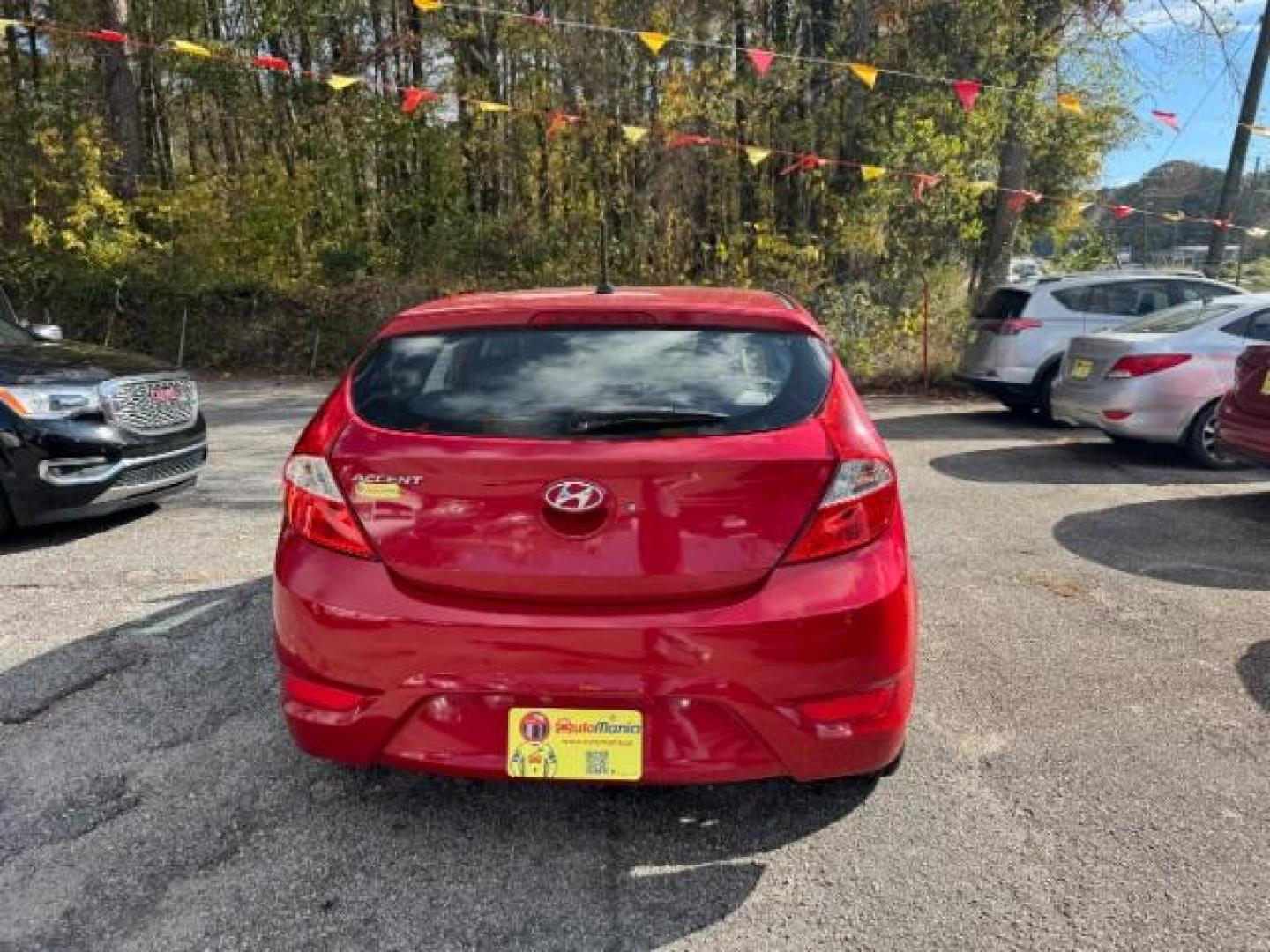 2017 Red Hyundai Accent SE 5-Door 6A (KMHCT5AE0HU) with an 1.6L L4 DOHC 16V engine, 6-Speed Automatic transmission, located at 1806 Veterans Memorial Hwy SW, Austell, GA, 30168, (770) 944-9558, 33.817959, -84.606987 - Photo#4