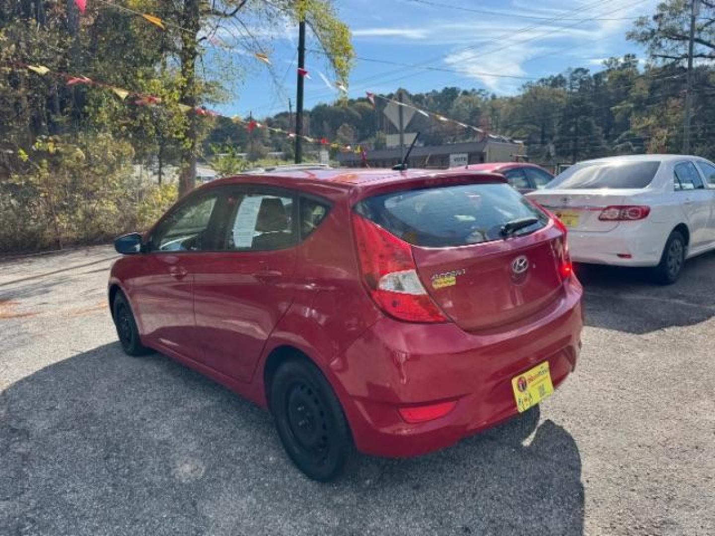 2017 Red Hyundai Accent SE 5-Door 6A (KMHCT5AE0HU) with an 1.6L L4 DOHC 16V engine, 6-Speed Automatic transmission, located at 1806 Veterans Memorial Hwy SW, Austell, GA, 30168, (770) 944-9558, 33.817959, -84.606987 - Photo#5