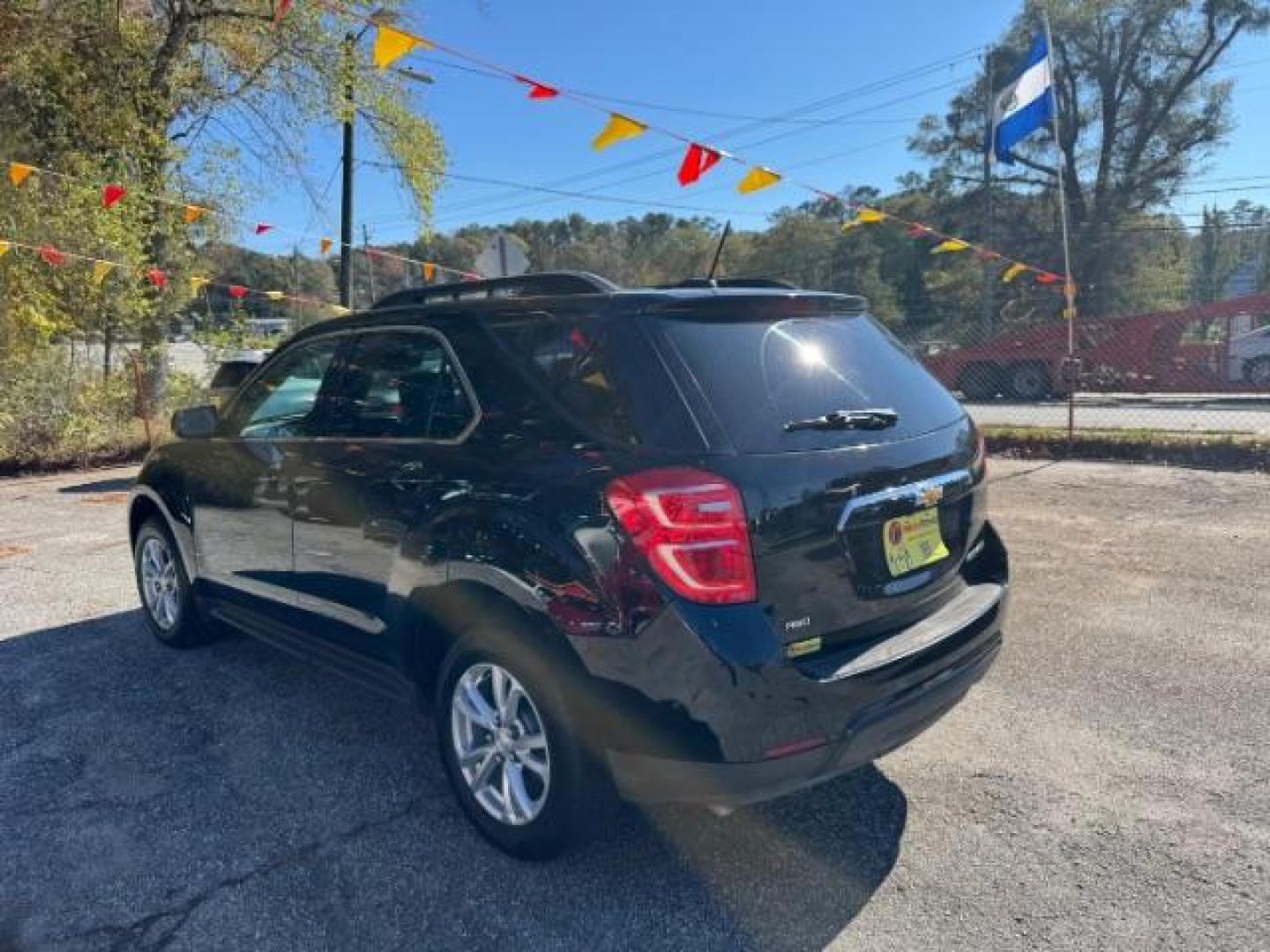 2016 Black Chevrolet Equinox LT AWD (2GNFLFEK6G6) with an 2.4L L4 DOHC 16V FFV engine, 6-Speed Automatic transmission, located at 1806 Veterans Memorial Hwy SW, Austell, GA, 30168, (770) 944-9558, 33.817959, -84.606987 - Photo#5