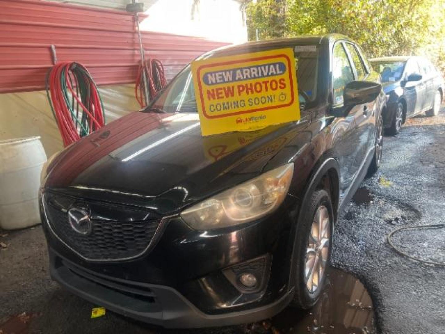 2015 Black Mazda CX-5 Grand Touring AWD (JM3KE4DY3F0) with an 2.5L L4 DOHC 16V engine, 6-Speed Automatic transmission, located at 1806 Veterans Memorial Hwy SW, Austell, GA, 30168, (770) 944-9558, 33.817959, -84.606987 - Photo#0