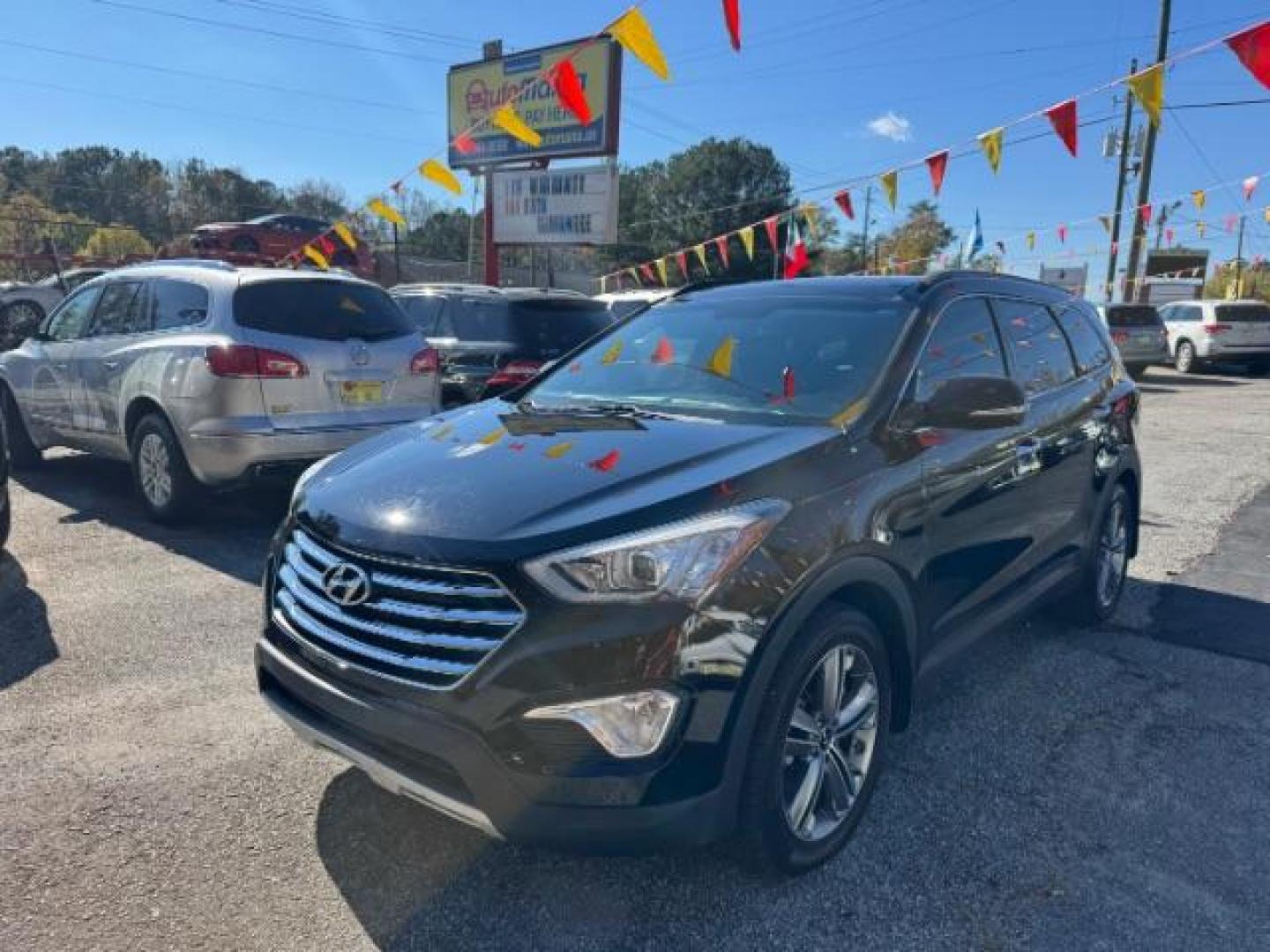 2015 Black Hyundai Santa Fe Limited FWD (KM8SR4HF2FU) with an 3.3L V6 DOHC 24V engine, 6-Speed Automatic transmission, located at 1806 Veterans Memorial Hwy SW, Austell, GA, 30168, (770) 944-9558, 33.817959, -84.606987 - Photo#0