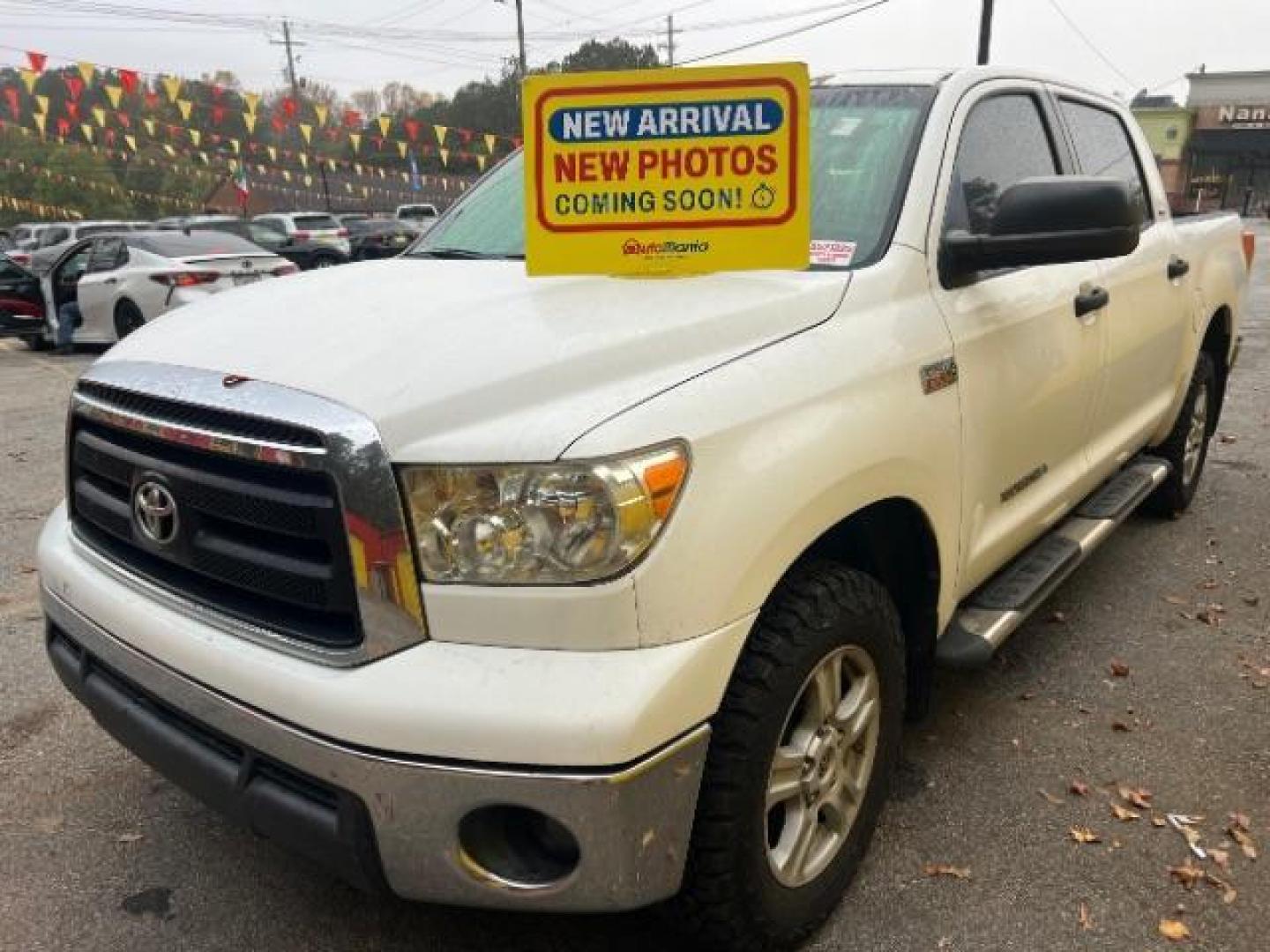 2013 White Toyota Tundra Tundra-Grade CrewMax 5.7L FFV 4WD (5TFDW5F11DX) with an 5.7L V8 DOHC 32V FFV engine, 6-Speed Automatic Overdrive transmission, located at 1806 Veterans Memorial Hwy SW, Austell, GA, 30168, (770) 944-9558, 33.817959, -84.606987 - Photo#0