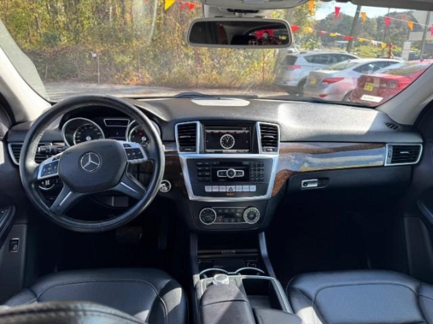 2014 Black Mercedes-Benz M-Class ML350 4MATIC (4JGDA5HB4EA) with an 3.5L V6 DOHC 24V engine, 7-Speed Automatic transmission, located at 1806 Veterans Memorial Hwy SW, Austell, GA, 30168, (770) 944-9558, 33.817959, -84.606987 - Photo#10