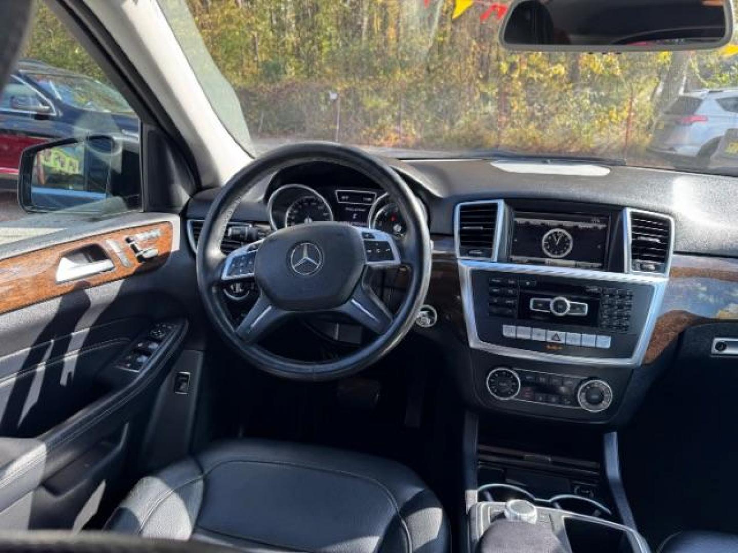 2014 Black Mercedes-Benz M-Class ML350 4MATIC (4JGDA5HB4EA) with an 3.5L V6 DOHC 24V engine, 7-Speed Automatic transmission, located at 1806 Veterans Memorial Hwy SW, Austell, GA, 30168, (770) 944-9558, 33.817959, -84.606987 - Photo#12