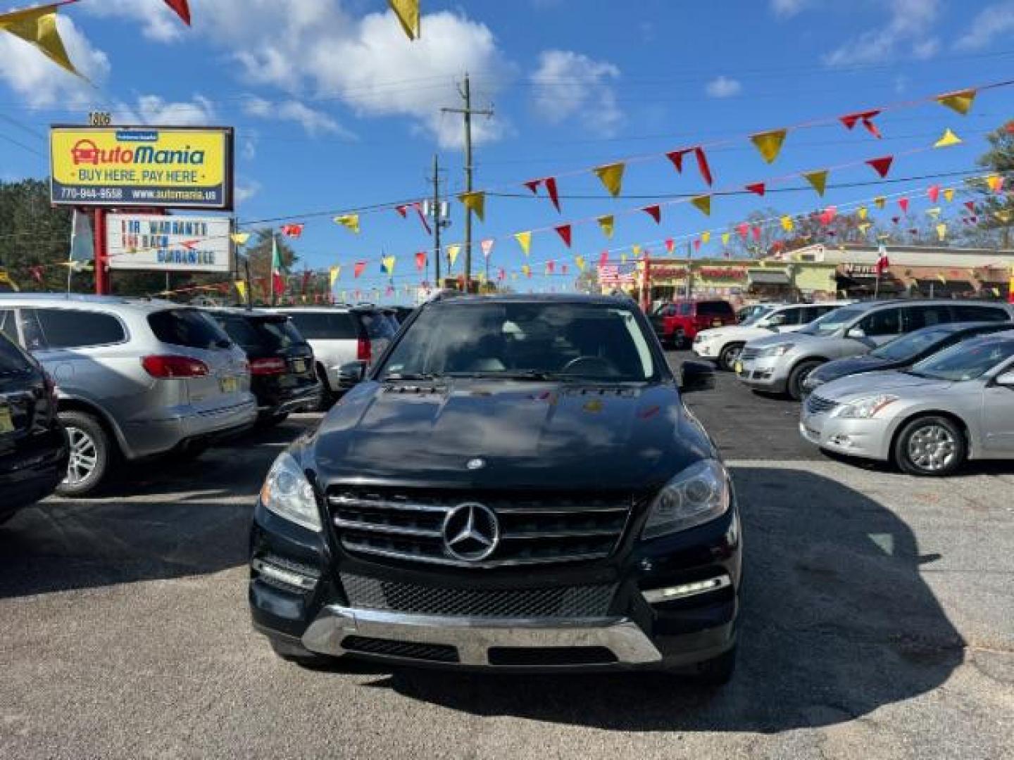 2014 Black Mercedes-Benz M-Class ML350 4MATIC (4JGDA5HB4EA) with an 3.5L V6 DOHC 24V engine, 7-Speed Automatic transmission, located at 1806 Veterans Memorial Hwy SW, Austell, GA, 30168, (770) 944-9558, 33.817959, -84.606987 - Photo#0