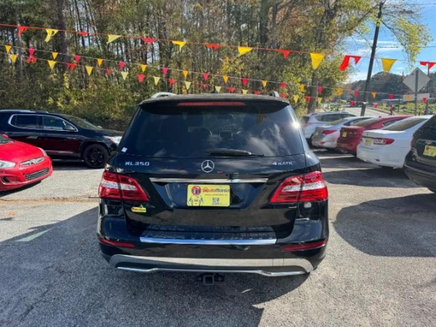 2014 Black Mercedes-Benz M-Class ML350 4MATIC (4JGDA5HB4EA) with an 3.5L V6 DOHC 24V engine, 7-Speed Automatic transmission, located at 1806 Veterans Memorial Hwy SW, Austell, GA, 30168, (770) 944-9558, 33.817959, -84.606987 - Photo#4