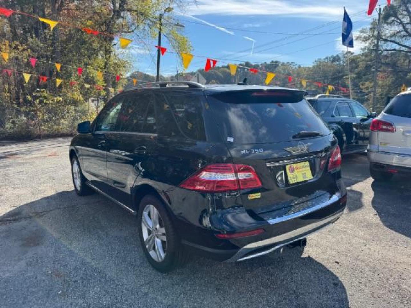 2014 Black Mercedes-Benz M-Class ML350 4MATIC (4JGDA5HB4EA) with an 3.5L V6 DOHC 24V engine, 7-Speed Automatic transmission, located at 1806 Veterans Memorial Hwy SW, Austell, GA, 30168, (770) 944-9558, 33.817959, -84.606987 - Photo#5