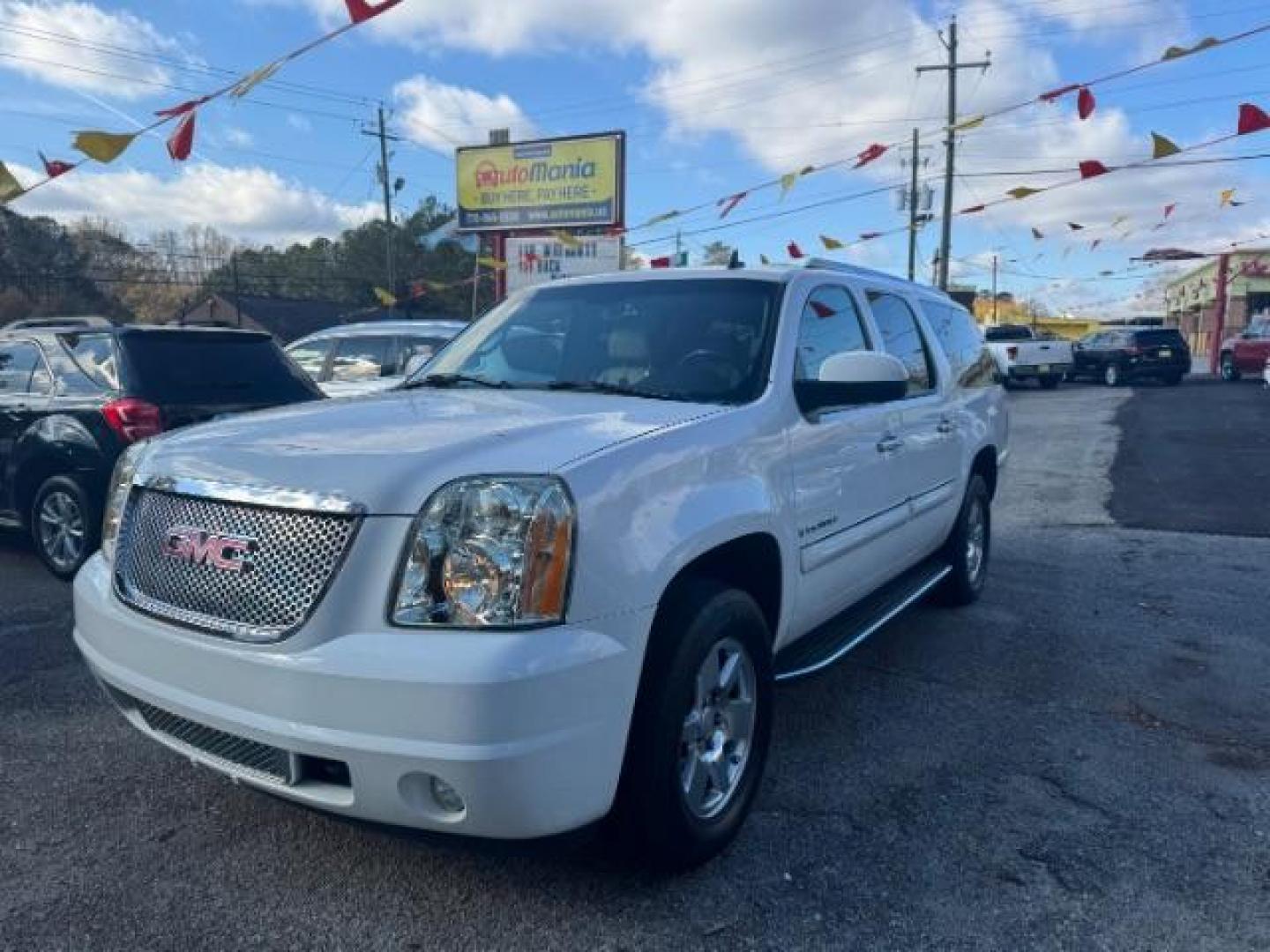 2007 White GMC Yukon Denali XL AWD (1GKFK66887J) with an 6.2L V8 OHV 16V engine, 4-Speed Automatic transmission, located at 1806 Veterans Memorial Hwy SW, Austell, GA, 30168, (770) 944-9558, 33.817959, -84.606987 - Photo#0