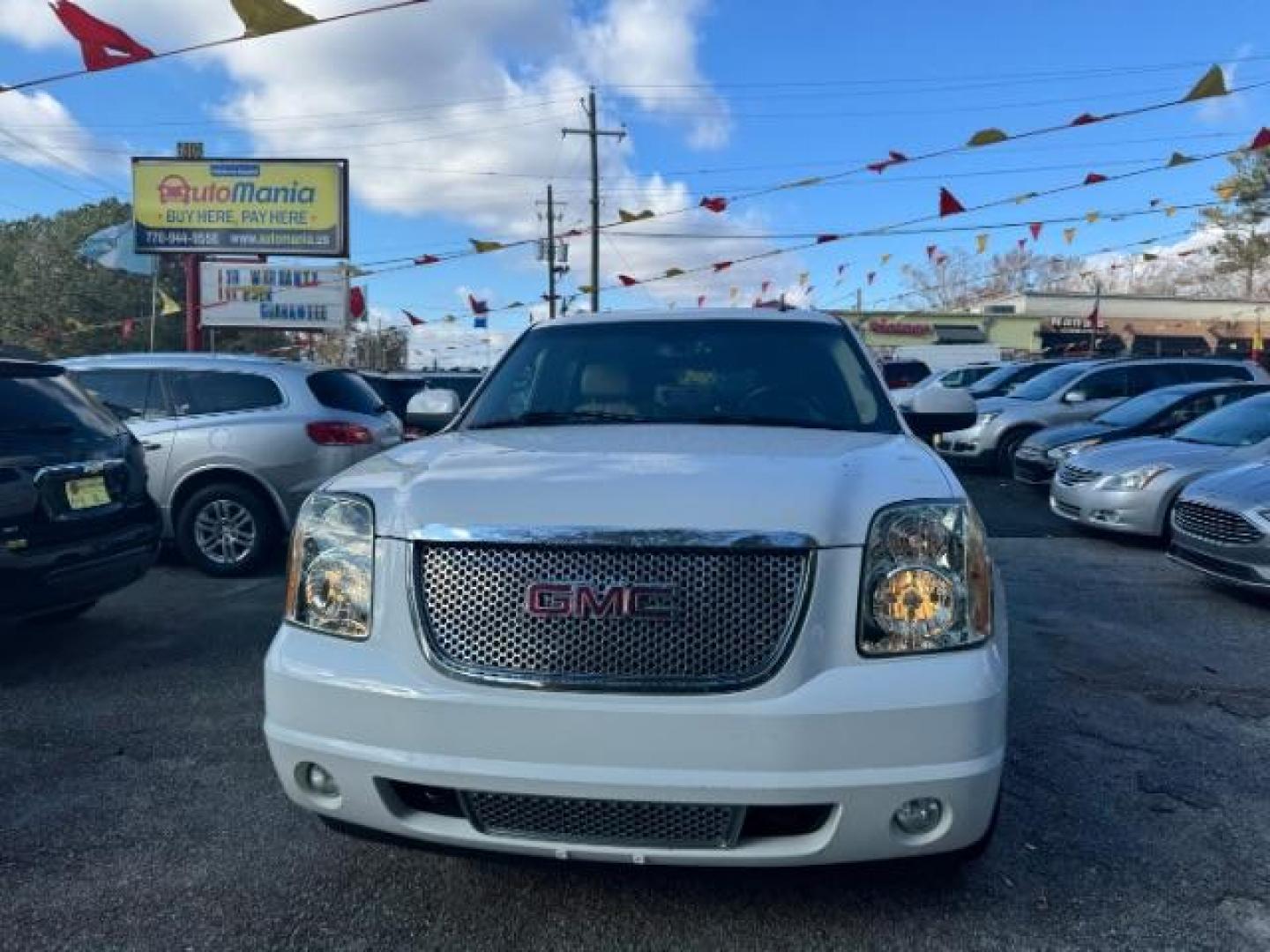 2007 White GMC Yukon Denali XL AWD (1GKFK66887J) with an 6.2L V8 OHV 16V engine, 4-Speed Automatic transmission, located at 1806 Veterans Memorial Hwy SW, Austell, GA, 30168, (770) 944-9558, 33.817959, -84.606987 - Photo#1