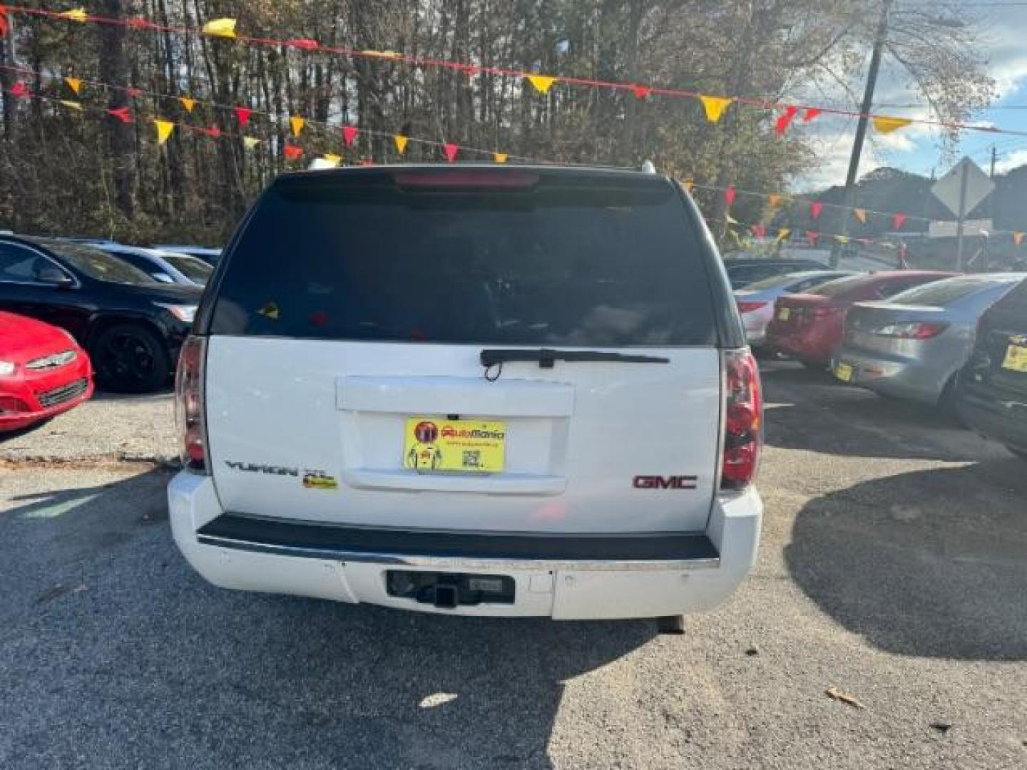 2007 White GMC Yukon Denali XL AWD (1GKFK66887J) with an 6.2L V8 OHV 16V engine, 4-Speed Automatic transmission, located at 1806 Veterans Memorial Hwy SW, Austell, GA, 30168, (770) 944-9558, 33.817959, -84.606987 - Photo#4