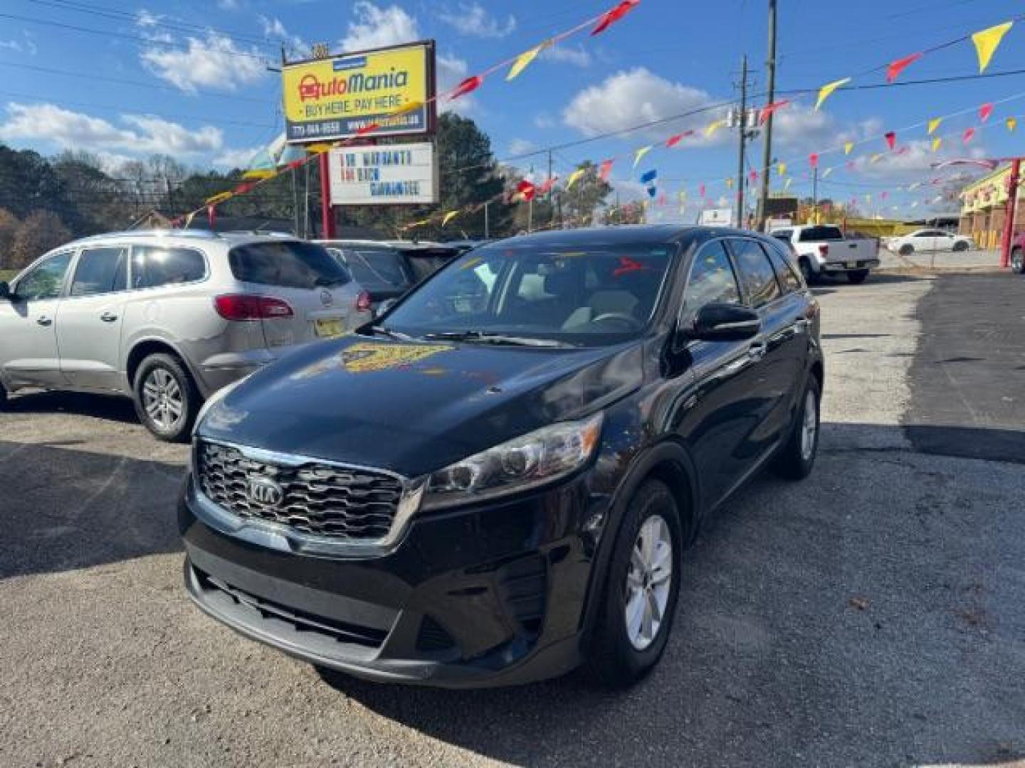 2019 Black Kia Sorento LX 2WD (5XYPG4A34KG) with an 2.4L L4 DOHC 16V engine, 6-Speed Automatic transmission, located at 1806 Veterans Memorial Hwy SW, Austell, GA, 30168, (770) 944-9558, 33.817959, -84.606987 - Photo#0