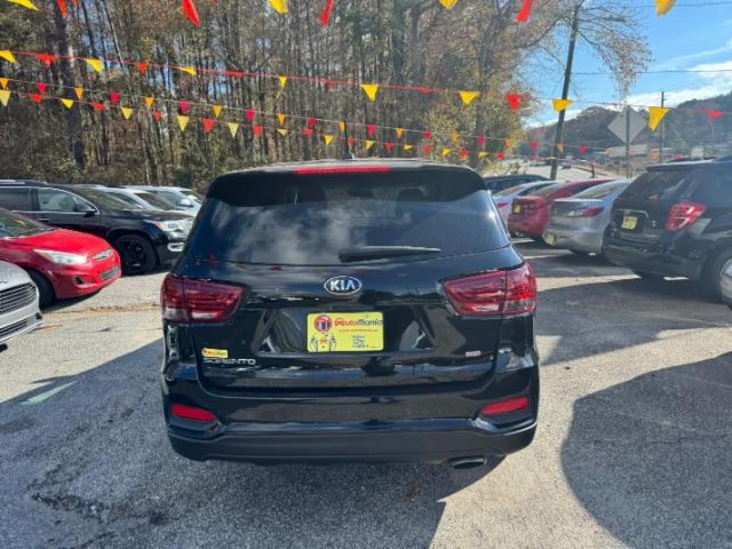 2019 Black Kia Sorento LX 2WD (5XYPG4A34KG) with an 2.4L L4 DOHC 16V engine, 6-Speed Automatic transmission, located at 1806 Veterans Memorial Hwy SW, Austell, GA, 30168, (770) 944-9558, 33.817959, -84.606987 - Photo#1