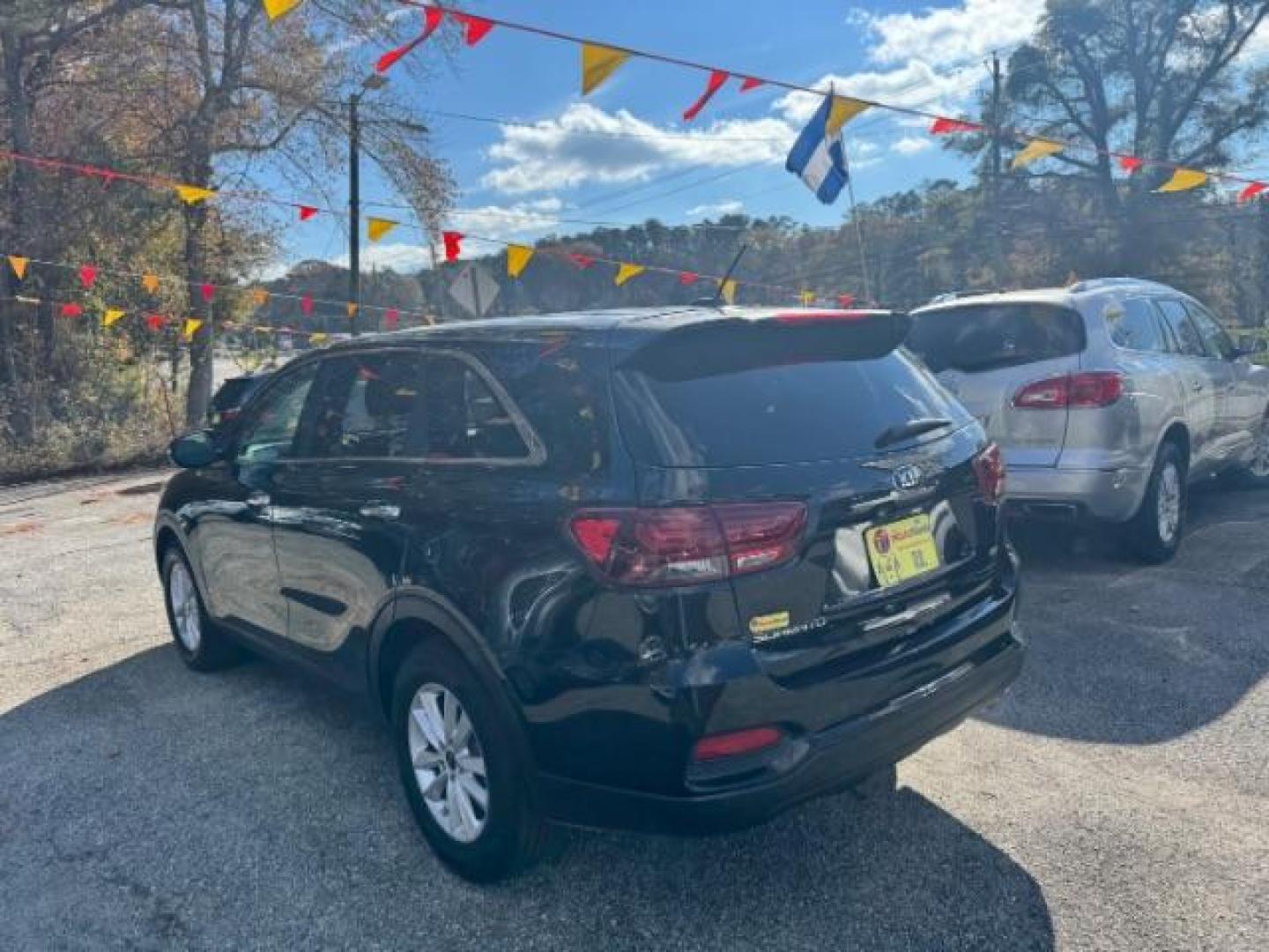 2019 Black Kia Sorento LX 2WD (5XYPG4A34KG) with an 2.4L L4 DOHC 16V engine, 6-Speed Automatic transmission, located at 1806 Veterans Memorial Hwy SW, Austell, GA, 30168, (770) 944-9558, 33.817959, -84.606987 - Photo#2