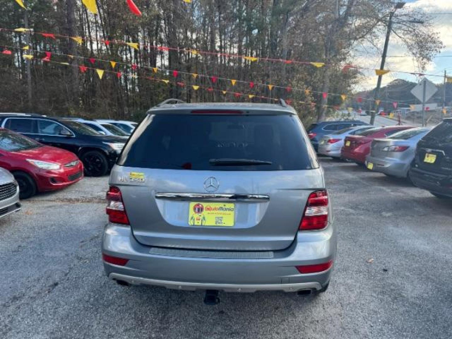 2010 Gray Mercedes-Benz M-Class ML350 (4JGBB5GB4AA) with an 3.5L V6 DOHC 24V engine, 7-Speed Automatic Overdrive transmission, located at 1806 Veterans Memorial Hwy SW, Austell, GA, 30168, (770) 944-9558, 33.817959, -84.606987 - Photo#2