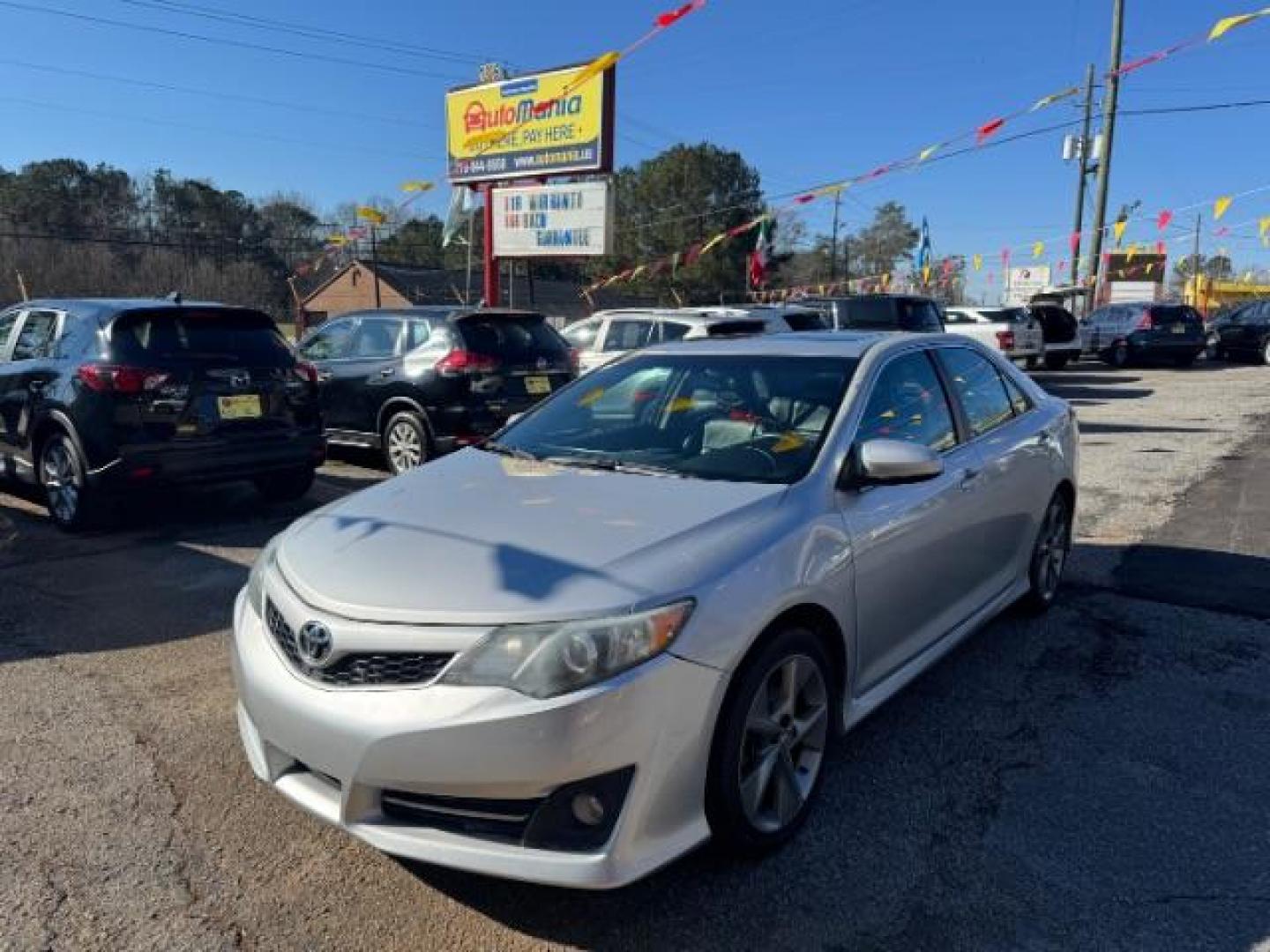 2014 Silver Toyota Camry SE (4T1BF1FK4EU) with an 2.5L L4 DOHC 16V engine, 6-Speed Automatic transmission, located at 1806 Veterans Memorial Hwy SW, Austell, GA, 30168, (770) 944-9558, 33.817959, -84.606987 - Photo#0