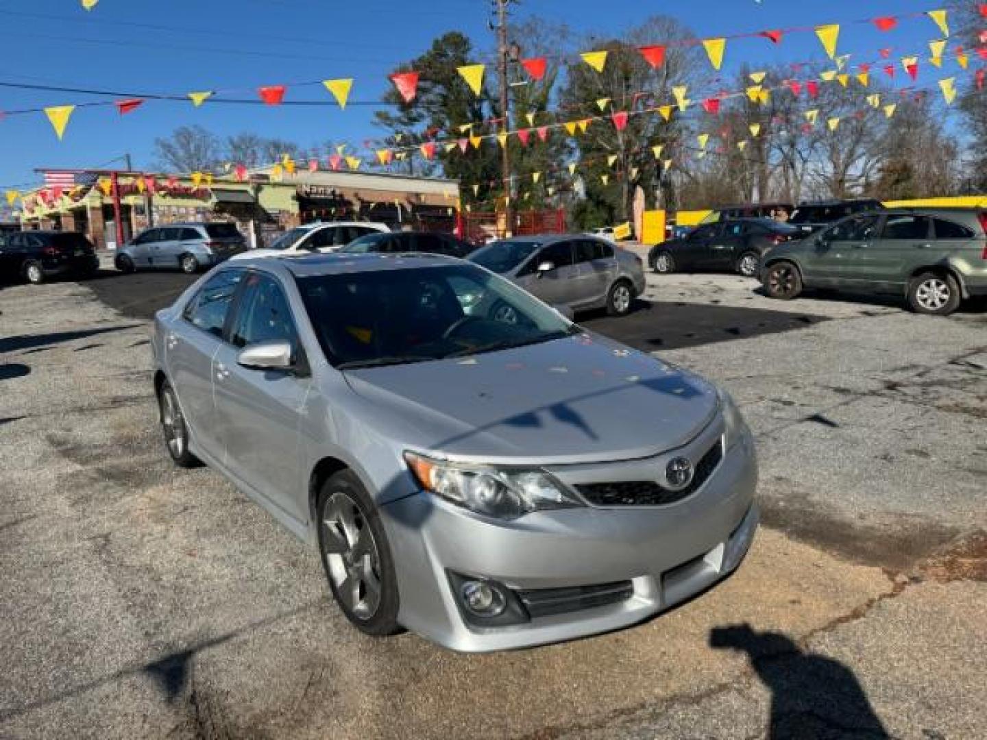 2014 Silver Toyota Camry SE (4T1BF1FK4EU) with an 2.5L L4 DOHC 16V engine, 6-Speed Automatic transmission, located at 1806 Veterans Memorial Hwy SW, Austell, GA, 30168, (770) 944-9558, 33.817959, -84.606987 - Photo#1