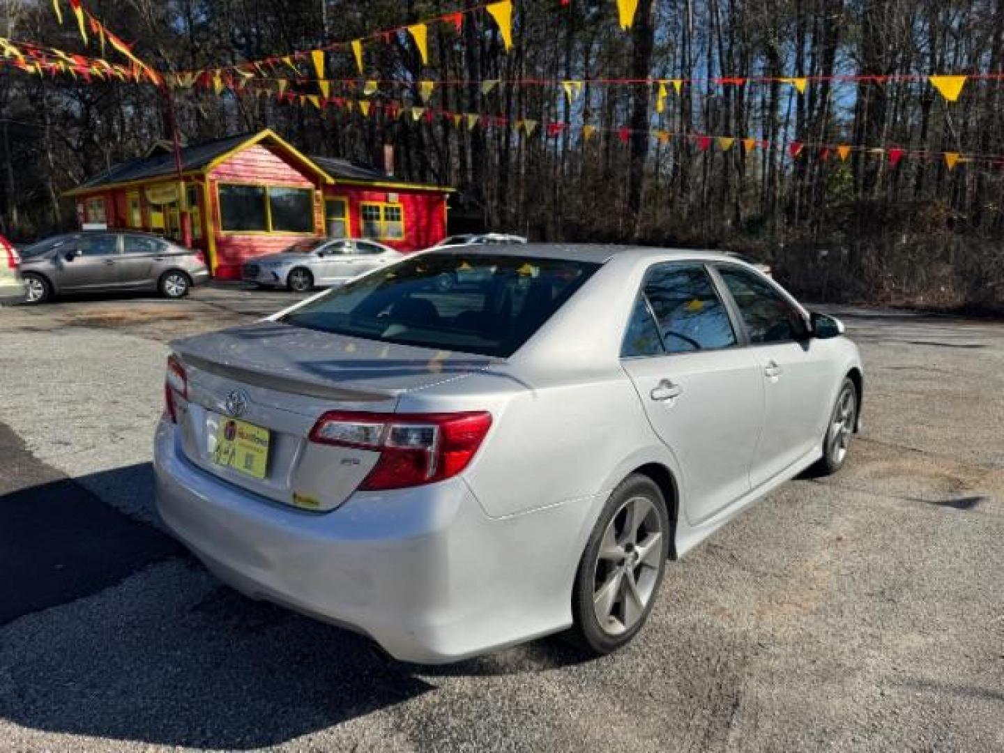 2014 Silver Toyota Camry SE (4T1BF1FK4EU) with an 2.5L L4 DOHC 16V engine, 6-Speed Automatic transmission, located at 1806 Veterans Memorial Hwy SW, Austell, GA, 30168, (770) 944-9558, 33.817959, -84.606987 - Photo#3