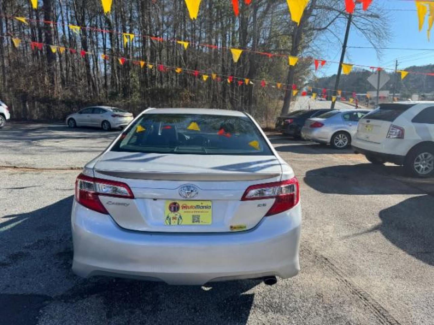 2014 Silver Toyota Camry SE (4T1BF1FK4EU) with an 2.5L L4 DOHC 16V engine, 6-Speed Automatic transmission, located at 1806 Veterans Memorial Hwy SW, Austell, GA, 30168, (770) 944-9558, 33.817959, -84.606987 - Photo#4