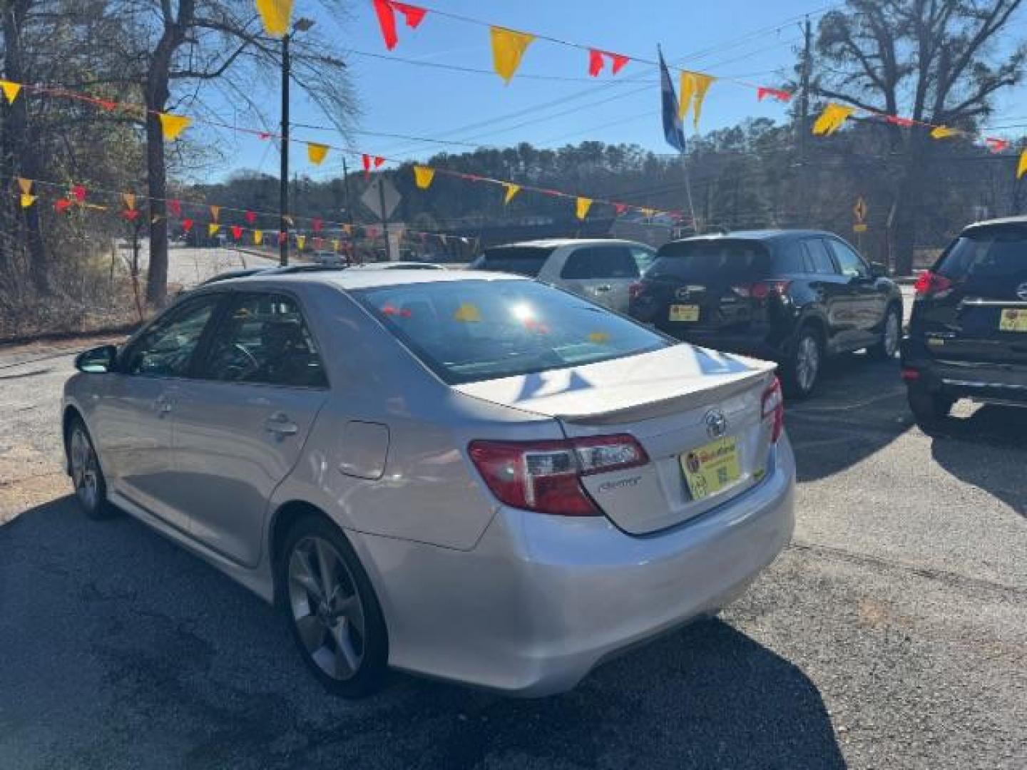 2014 Silver Toyota Camry SE (4T1BF1FK4EU) with an 2.5L L4 DOHC 16V engine, 6-Speed Automatic transmission, located at 1806 Veterans Memorial Hwy SW, Austell, GA, 30168, (770) 944-9558, 33.817959, -84.606987 - Photo#5