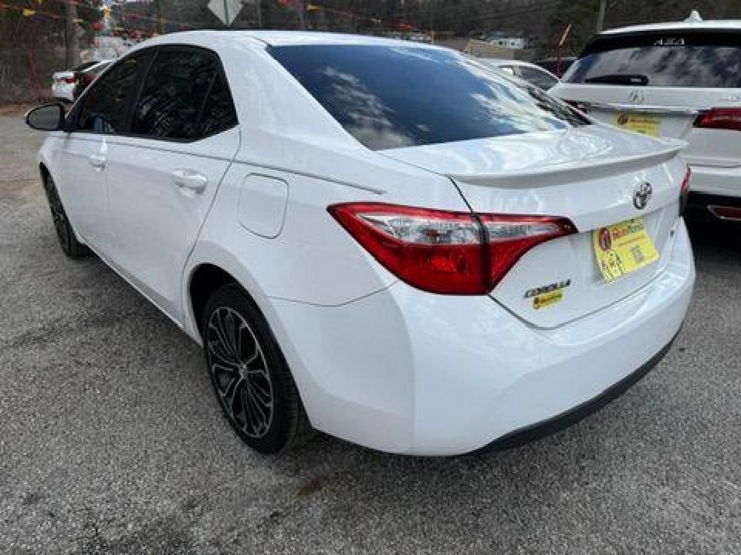 2014 White Toyota Corolla LE CVT (2T1BURHE1EC) with an 1.8L L4 DOHC 16V engine, Continuously Variable Transmission transmission, located at 1806 Veterans Memorial Hwy SW, Austell, GA, 30168, (770) 944-9558, 33.817959, -84.606987 - Photo#4