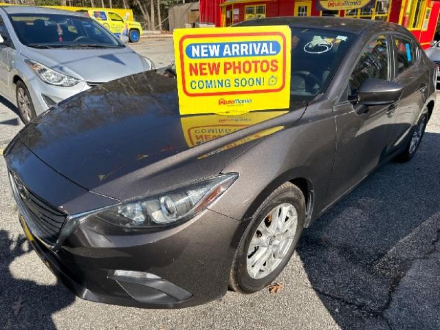 2014 Gray Mazda MAZDA3 i Touring AT 4-Door (JM1BM1V73E1) with an 2.0L L4 DOHC 16V engine, 6-Speed Automatic transmission, located at 1806 Veterans Memorial Hwy SW, Austell, GA, 30168, (770) 944-9558, 33.817959, -84.606987 - Photo#0