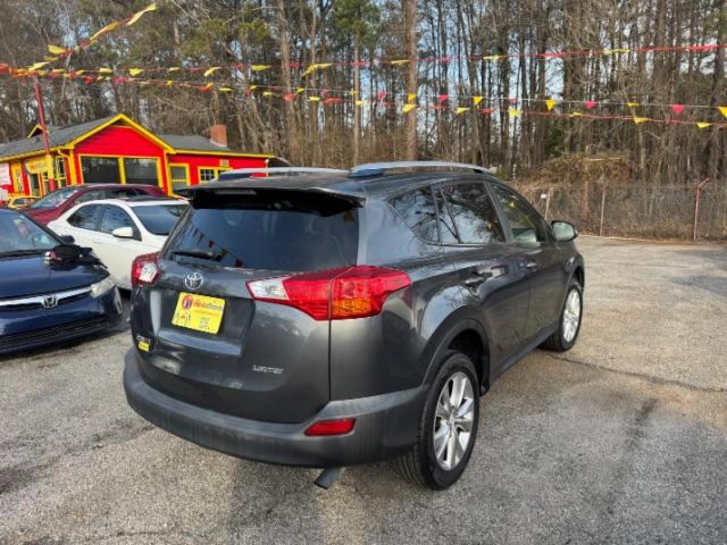 2013 Gray Toyota RAV4 Limited FWD (JTMYFREV0DD) with an 2.5L L4 DOHC 16V engine, 6-Speed Automatic transmission, located at 1806 Veterans Memorial Hwy SW, Austell, GA, 30168, (770) 944-9558, 33.817959, -84.606987 - Photo#2