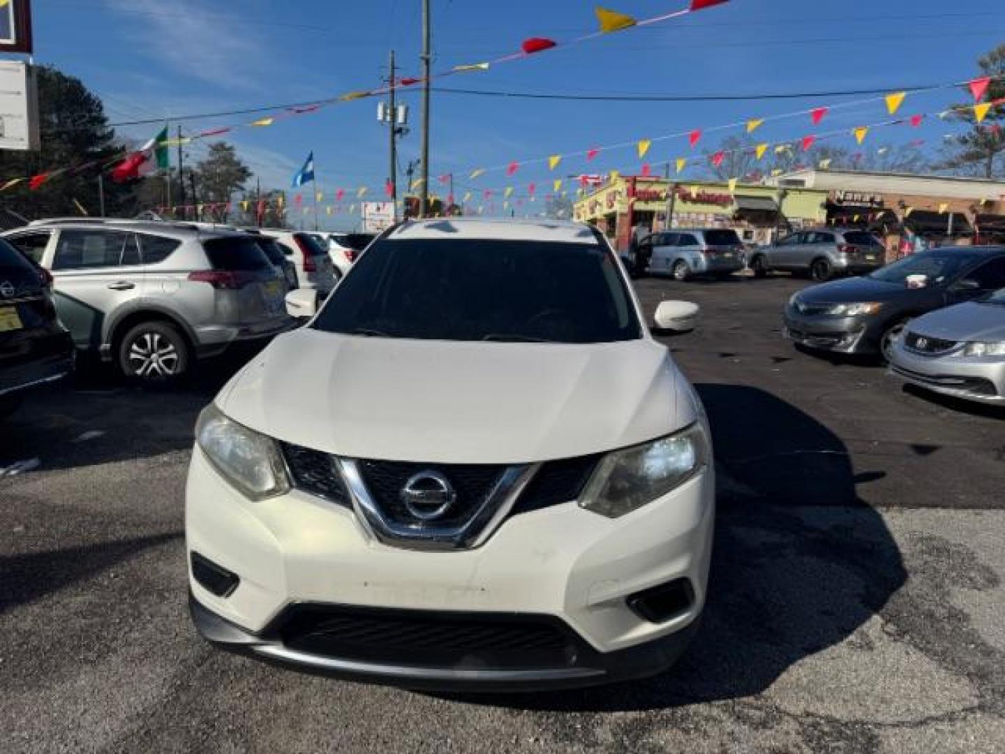 2014 White Nissan Rogue S 2WD (5N1AT2MT1EC) with an 2.5L L4 DOHC 16V engine, Continuously Variable Transmission transmission, located at 1806 Veterans Memorial Hwy SW, Austell, GA, 30168, (770) 944-9558, 33.817959, -84.606987 - Photo#1