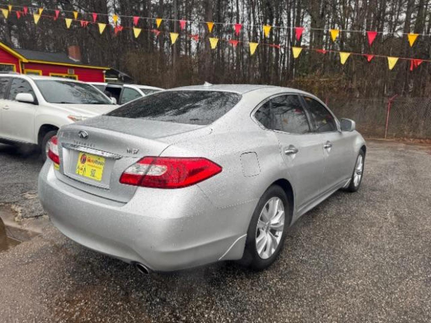 2011 Silver Infiniti M M37 (JN1BY1AP7BM) with an 3.7L V6 DOHC 24V engine, 7-Speed Automatic transmission, located at 1806 Veterans Memorial Hwy SW, Austell, GA, 30168, (770) 944-9558, 33.817959, -84.606987 - Photo#3