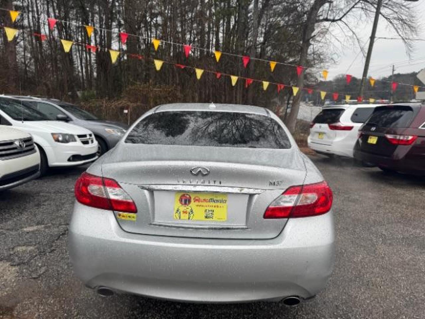 2011 Silver Infiniti M M37 (JN1BY1AP7BM) with an 3.7L V6 DOHC 24V engine, 7-Speed Automatic transmission, located at 1806 Veterans Memorial Hwy SW, Austell, GA, 30168, (770) 944-9558, 33.817959, -84.606987 - Photo#4