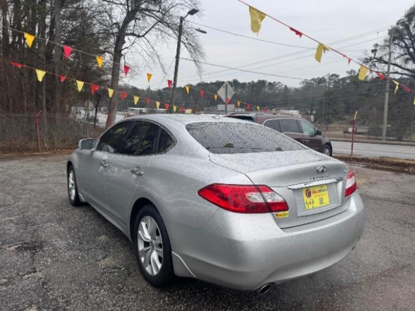 2011 Silver Infiniti M M37 (JN1BY1AP7BM) with an 3.7L V6 DOHC 24V engine, 7-Speed Automatic transmission, located at 1806 Veterans Memorial Hwy SW, Austell, GA, 30168, (770) 944-9558, 33.817959, -84.606987 - Photo#5