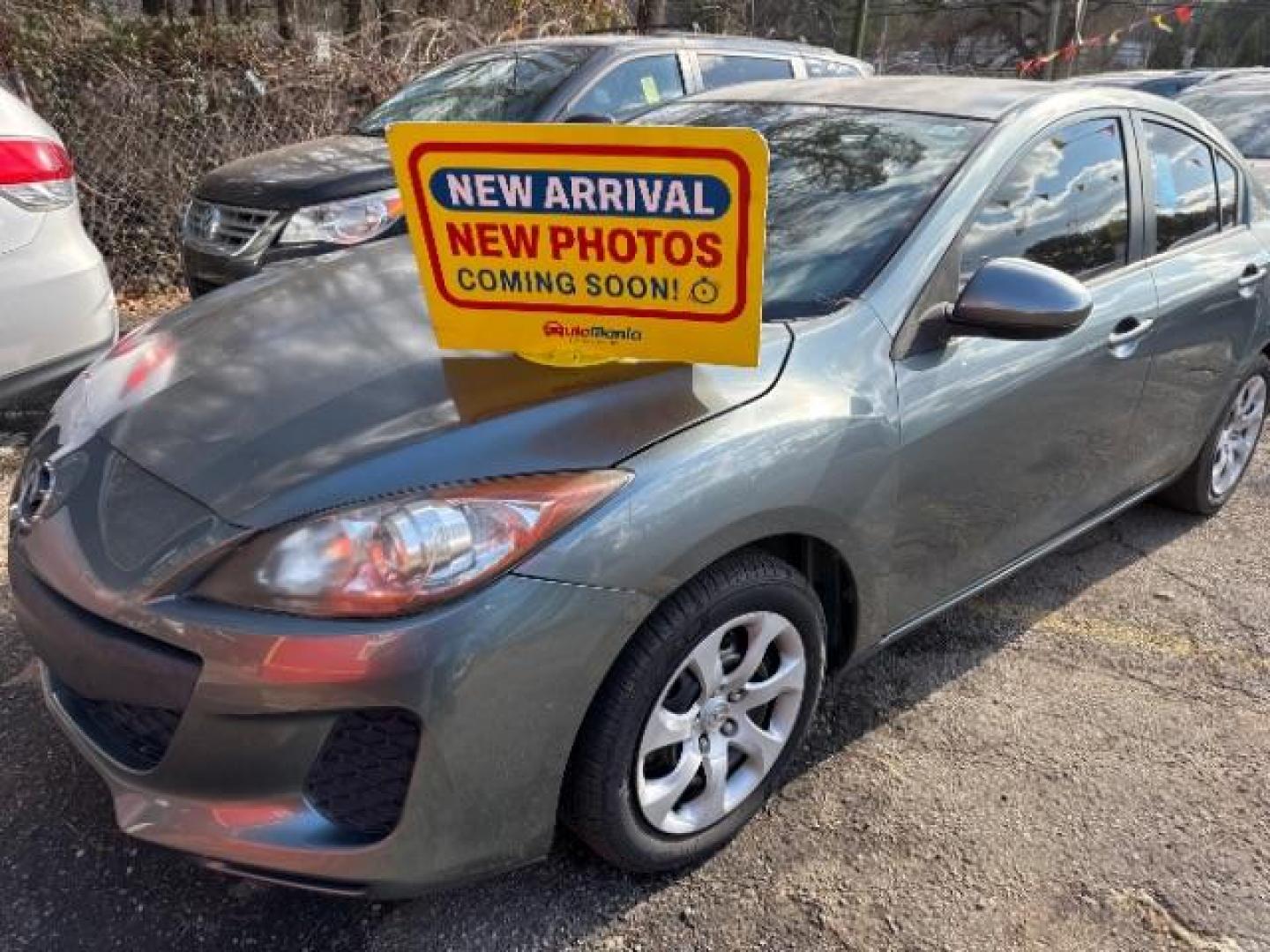 2012 Gray Mazda MAZDA3 i Sport 4-Door (JM1BL1UFXC1) with an 2.0L L4 DOHC 16V engine, located at 1806 Veterans Memorial Hwy SW, Austell, GA, 30168, (770) 944-9558, 33.817959, -84.606987 - Photo#0