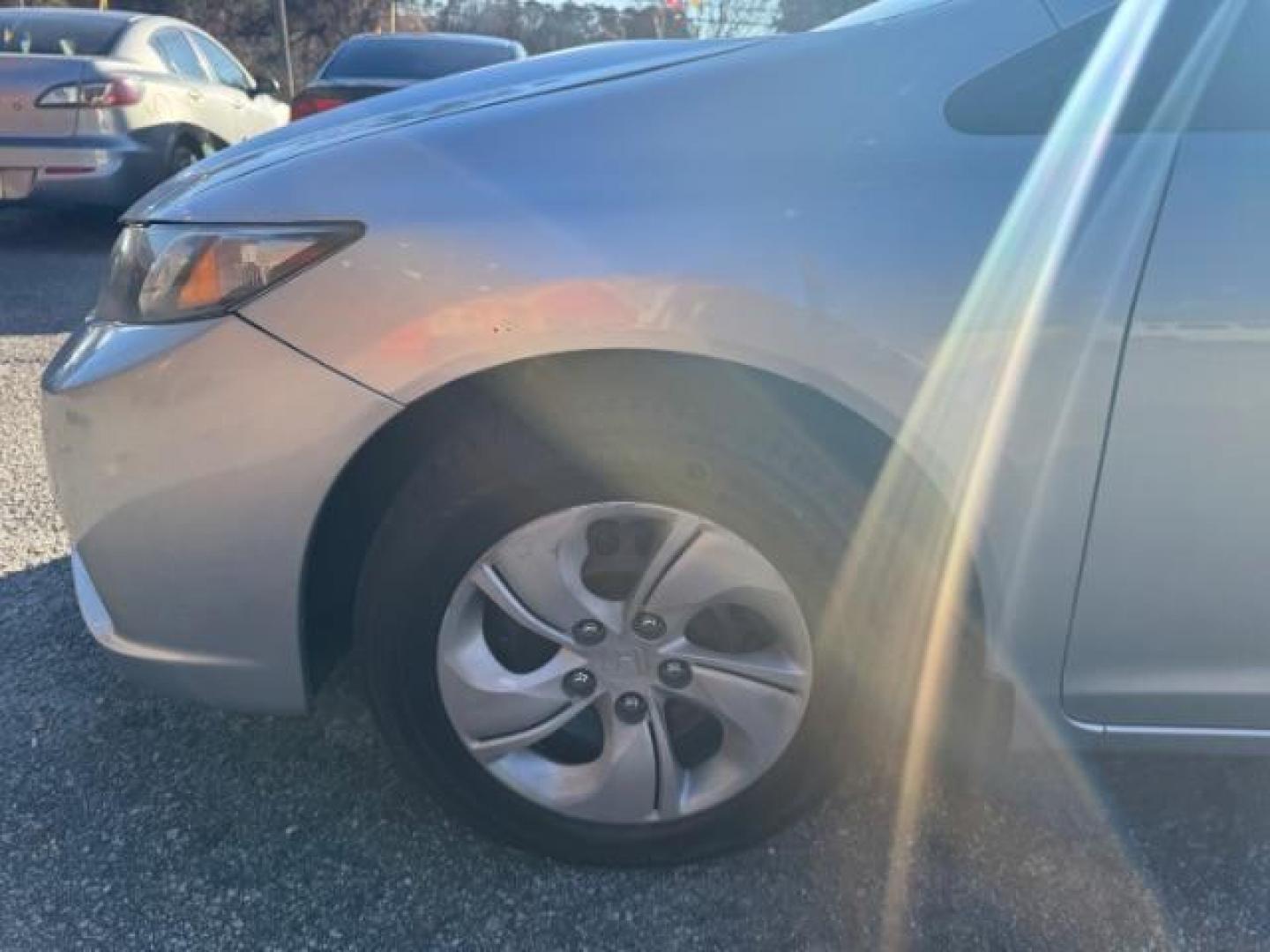 2013 Silver Honda Civic LX Sedan 5-Speed AT (19XFB2F59DE) with an 1.8L L4 SOHC 16V engine, 5-Speed Automatic transmission, located at 1806 Veterans Memorial Hwy SW, Austell, GA, 30168, (770) 944-9558, 33.817959, -84.606987 - Photo#17