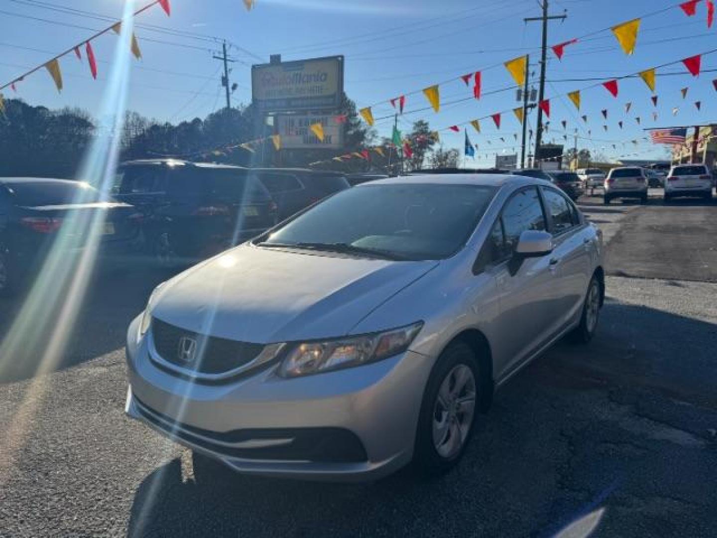 2013 Silver Honda Civic LX Sedan 5-Speed AT (19XFB2F59DE) with an 1.8L L4 SOHC 16V engine, 5-Speed Automatic transmission, located at 1806 Veterans Memorial Hwy SW, Austell, GA, 30168, (770) 944-9558, 33.817959, -84.606987 - Photo#0