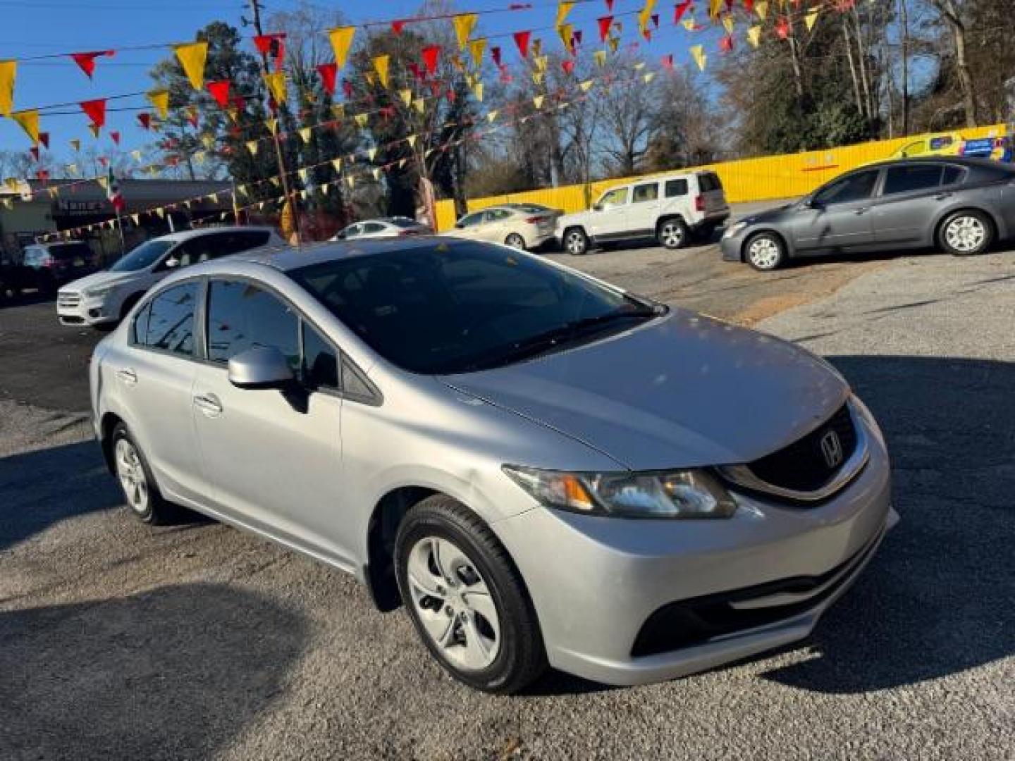 2013 Silver Honda Civic LX Sedan 5-Speed AT (19XFB2F59DE) with an 1.8L L4 SOHC 16V engine, 5-Speed Automatic transmission, located at 1806 Veterans Memorial Hwy SW, Austell, GA, 30168, (770) 944-9558, 33.817959, -84.606987 - Photo#1