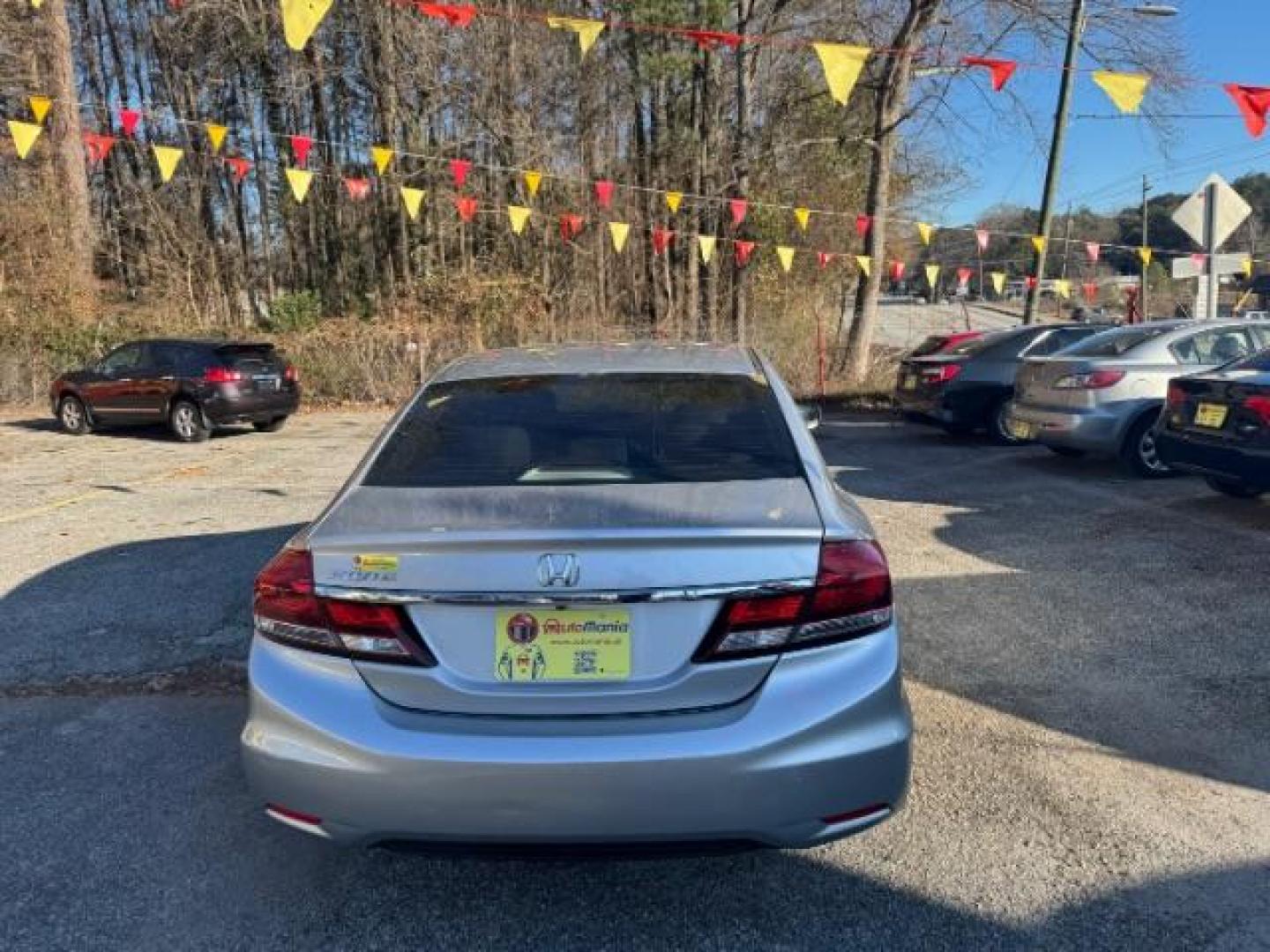 2013 Silver Honda Civic LX Sedan 5-Speed AT (19XFB2F59DE) with an 1.8L L4 SOHC 16V engine, 5-Speed Automatic transmission, located at 1806 Veterans Memorial Hwy SW, Austell, GA, 30168, (770) 944-9558, 33.817959, -84.606987 - Photo#3