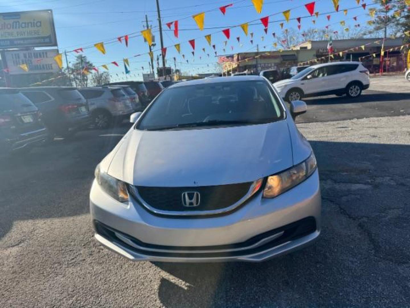 2013 Silver Honda Civic LX Sedan 5-Speed AT (19XFB2F59DE) with an 1.8L L4 SOHC 16V engine, 5-Speed Automatic transmission, located at 1806 Veterans Memorial Hwy SW, Austell, GA, 30168, (770) 944-9558, 33.817959, -84.606987 - Photo#7