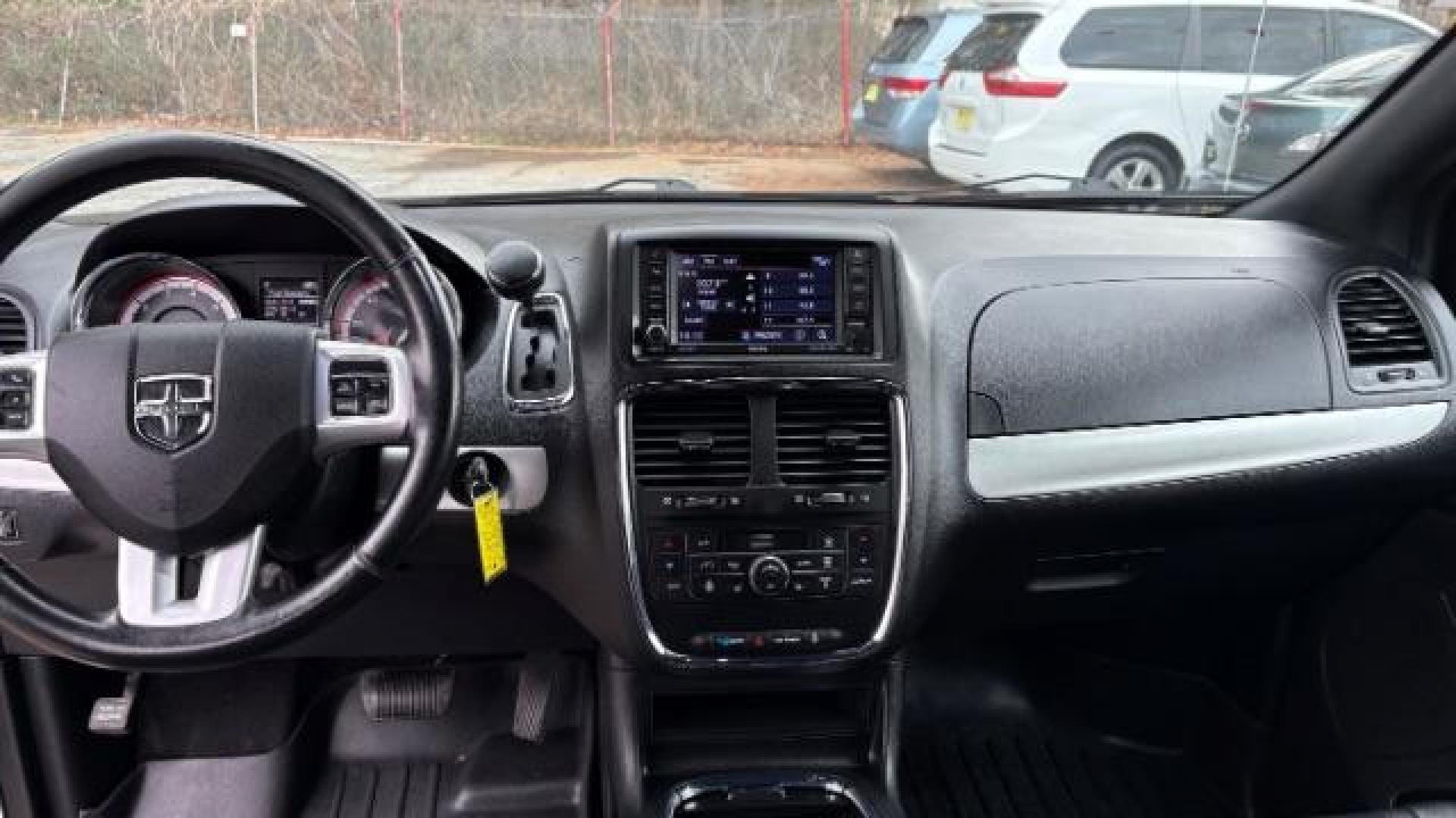 2019 White Dodge Grand Caravan GT (2C4RDGEG0KR) with an 3.6L V6 DOHC 24V engine, 6-Speed Automatic transmission, located at 1806 Veterans Memorial Hwy SW, Austell, GA, 30168, (770) 944-9558, 33.817959, -84.606987 - Photo#13