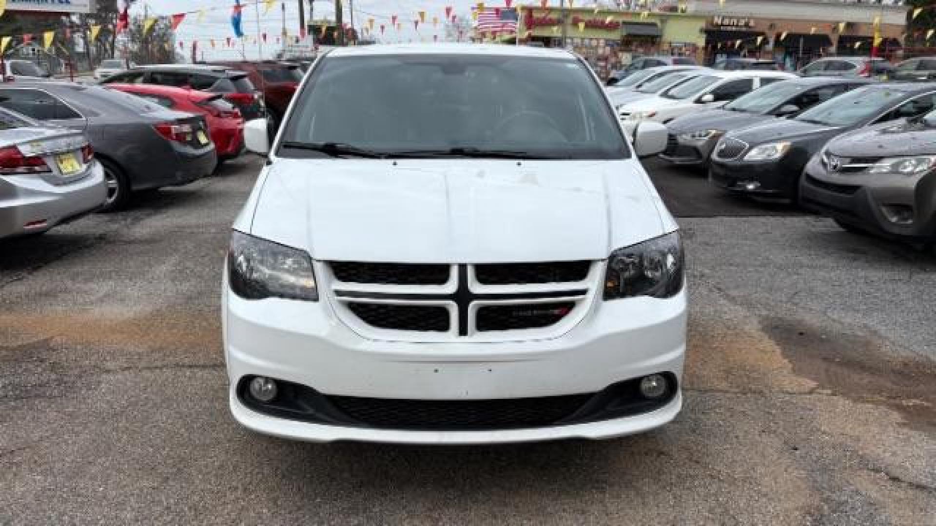 2019 White Dodge Grand Caravan GT (2C4RDGEG0KR) with an 3.6L V6 DOHC 24V engine, 6-Speed Automatic transmission, located at 1806 Veterans Memorial Hwy SW, Austell, GA, 30168, (770) 944-9558, 33.817959, -84.606987 - Photo#1