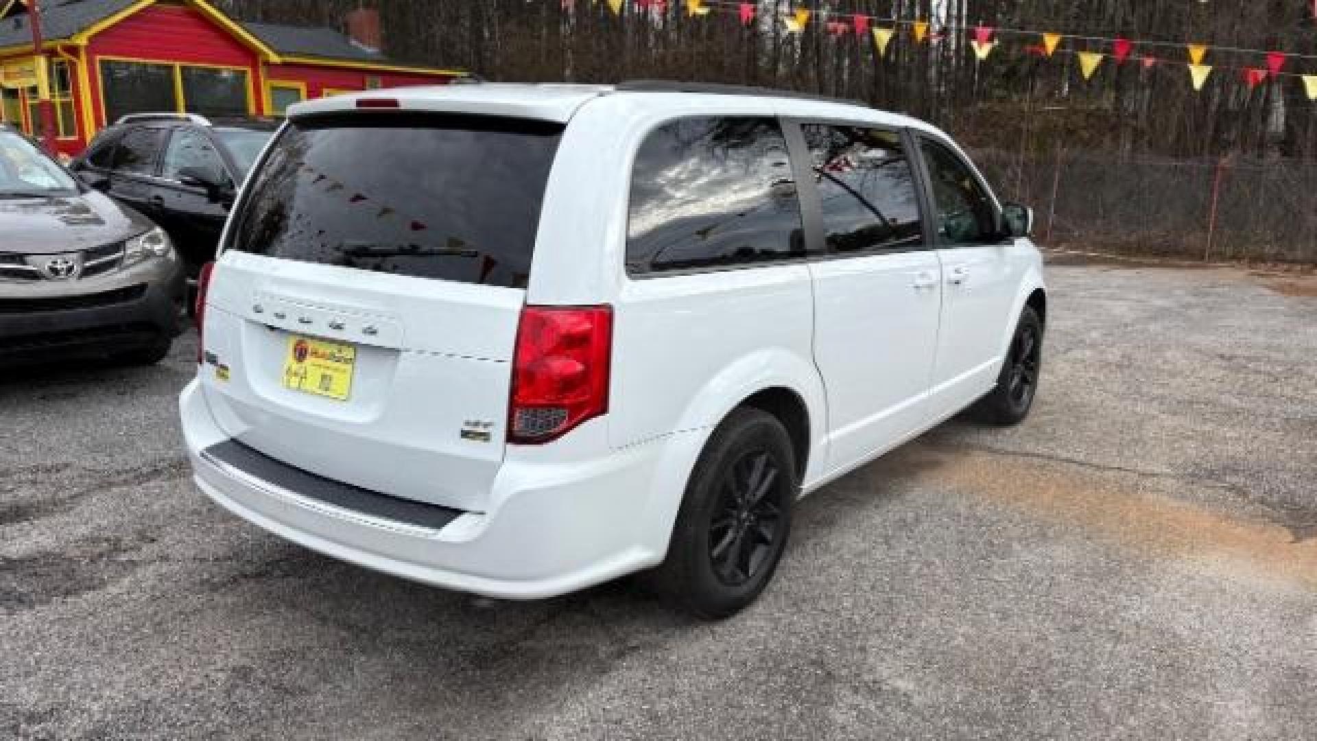 2019 White Dodge Grand Caravan GT (2C4RDGEG0KR) with an 3.6L V6 DOHC 24V engine, 6-Speed Automatic transmission, located at 1806 Veterans Memorial Hwy SW, Austell, GA, 30168, (770) 944-9558, 33.817959, -84.606987 - Photo#3