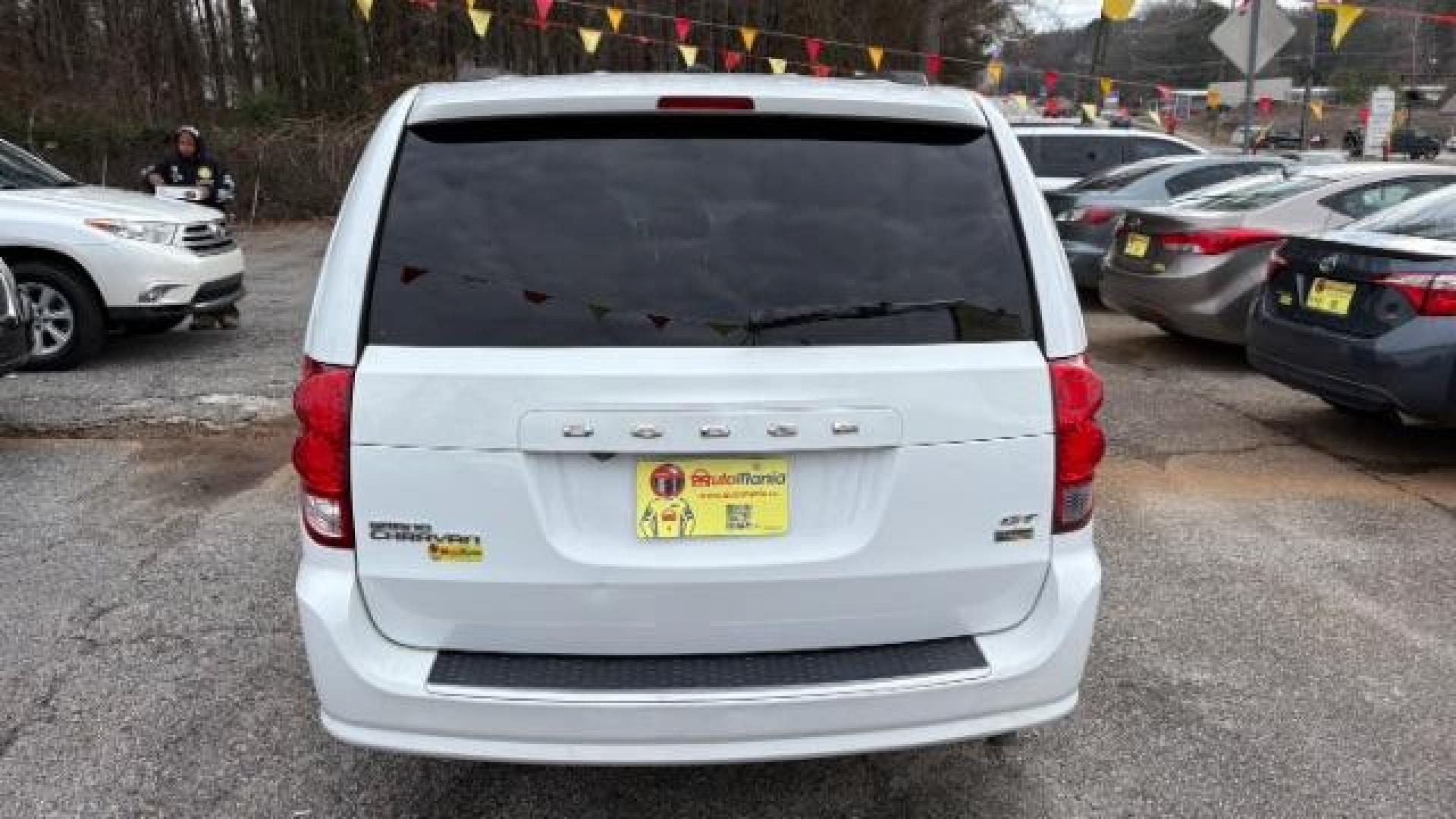 2019 White Dodge Grand Caravan GT (2C4RDGEG0KR) with an 3.6L V6 DOHC 24V engine, 6-Speed Automatic transmission, located at 1806 Veterans Memorial Hwy SW, Austell, GA, 30168, (770) 944-9558, 33.817959, -84.606987 - Photo#4