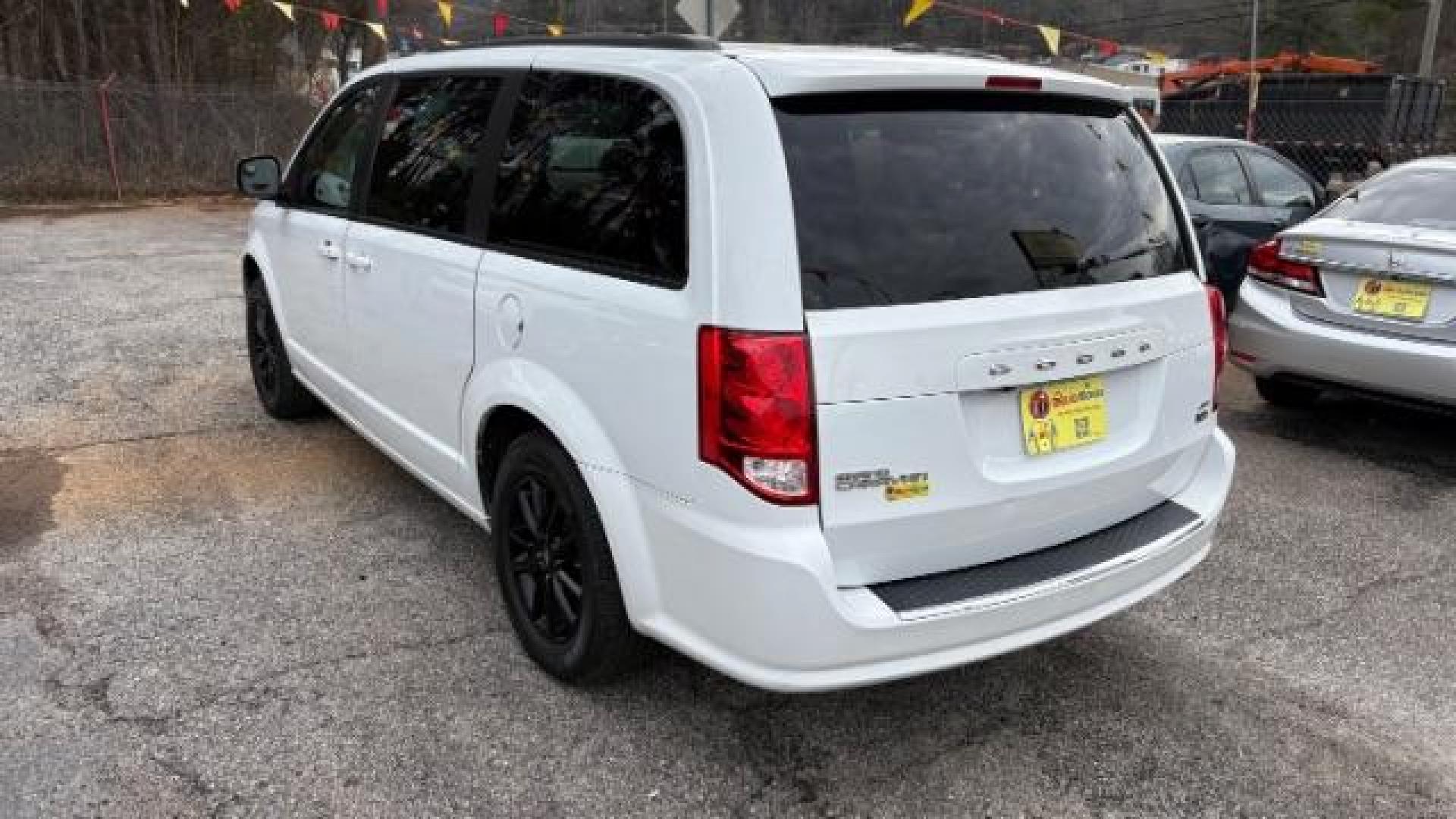 2019 White Dodge Grand Caravan GT (2C4RDGEG0KR) with an 3.6L V6 DOHC 24V engine, 6-Speed Automatic transmission, located at 1806 Veterans Memorial Hwy SW, Austell, GA, 30168, (770) 944-9558, 33.817959, -84.606987 - Photo#5