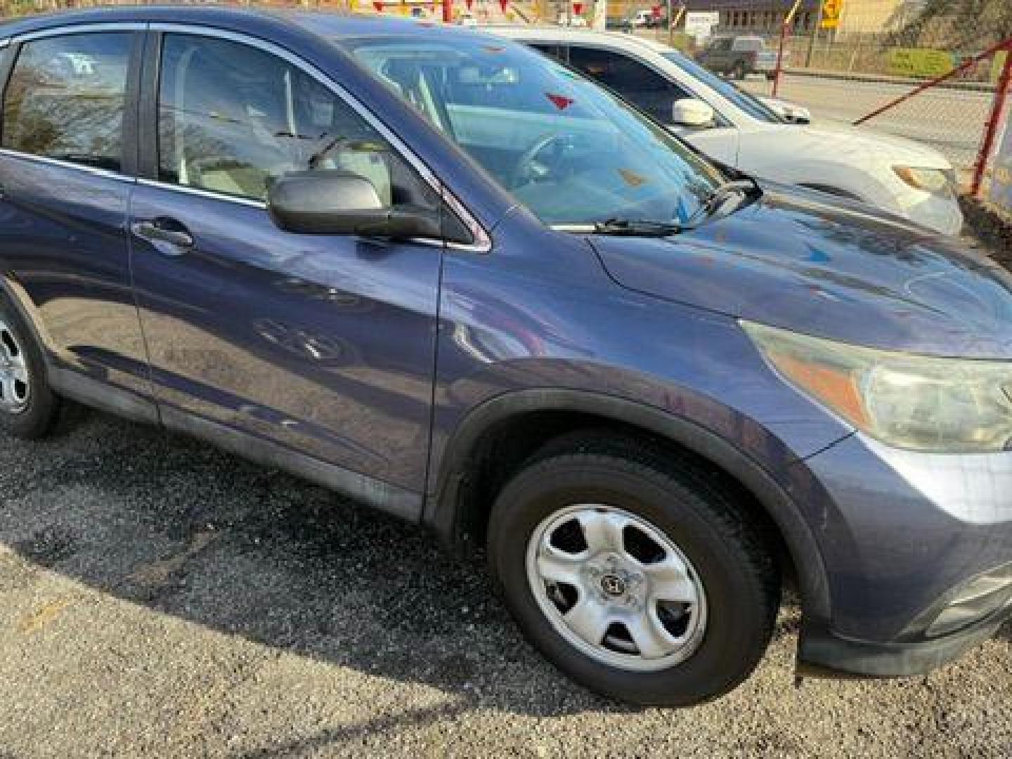 2014 Blue Honda CR-V LX 2WD 5-Speed AT (2HKRM3H35EH) with an 2.4L L4 DOHC 16V engine, 5-Speed Automatic transmission, located at 1806 Veterans Memorial Hwy SW, Austell, GA, 30168, (770) 944-9558, 33.817959, -84.606987 - Photo#8