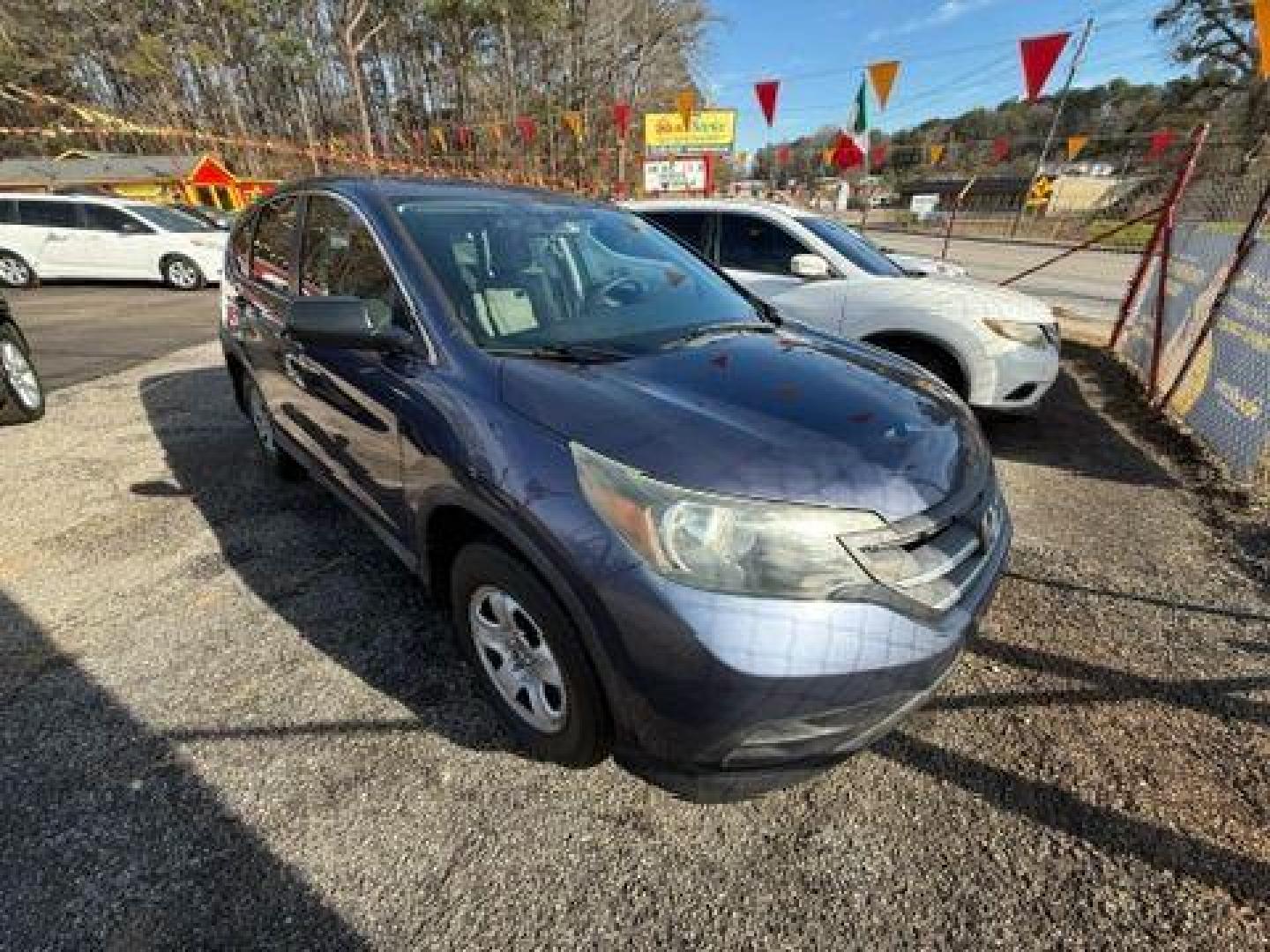 2014 Blue Honda CR-V LX 2WD 5-Speed AT (2HKRM3H35EH) with an 2.4L L4 DOHC 16V engine, 5-Speed Automatic transmission, located at 1806 Veterans Memorial Hwy SW, Austell, GA, 30168, (770) 944-9558, 33.817959, -84.606987 - Photo#9