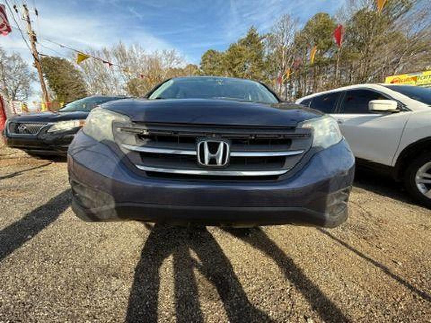 2014 Blue Honda CR-V LX 2WD 5-Speed AT (2HKRM3H35EH) with an 2.4L L4 DOHC 16V engine, 5-Speed Automatic transmission, located at 1806 Veterans Memorial Hwy SW, Austell, GA, 30168, (770) 944-9558, 33.817959, -84.606987 - Photo#11