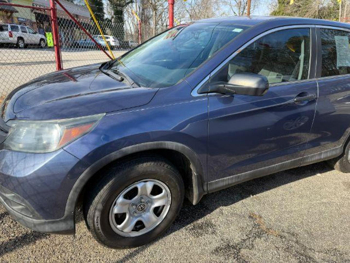 2014 Blue Honda CR-V LX 2WD 5-Speed AT (2HKRM3H35EH) with an 2.4L L4 DOHC 16V engine, 5-Speed Automatic transmission, located at 1806 Veterans Memorial Hwy SW, Austell, GA, 30168, (770) 944-9558, 33.817959, -84.606987 - Photo#1