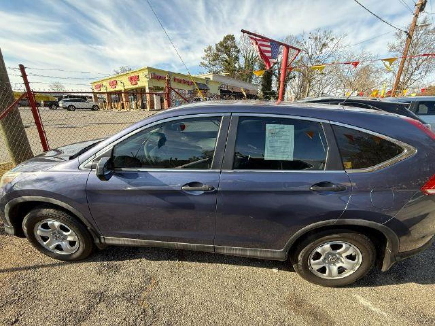 2014 Blue Honda CR-V LX 2WD 5-Speed AT (2HKRM3H35EH) with an 2.4L L4 DOHC 16V engine, 5-Speed Automatic transmission, located at 1806 Veterans Memorial Hwy SW, Austell, GA, 30168, (770) 944-9558, 33.817959, -84.606987 - Photo#2