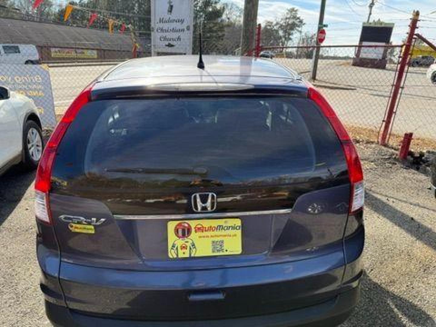 2014 Blue Honda CR-V LX 2WD 5-Speed AT (2HKRM3H35EH) with an 2.4L L4 DOHC 16V engine, 5-Speed Automatic transmission, located at 1806 Veterans Memorial Hwy SW, Austell, GA, 30168, (770) 944-9558, 33.817959, -84.606987 - Photo#3