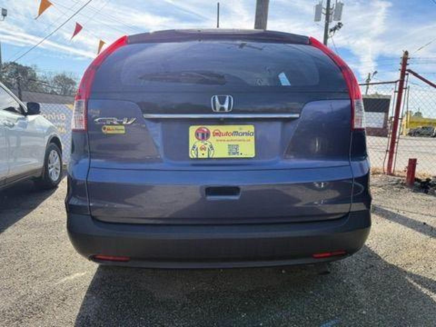 2014 Blue Honda CR-V LX 2WD 5-Speed AT (2HKRM3H35EH) with an 2.4L L4 DOHC 16V engine, 5-Speed Automatic transmission, located at 1806 Veterans Memorial Hwy SW, Austell, GA, 30168, (770) 944-9558, 33.817959, -84.606987 - Photo#5